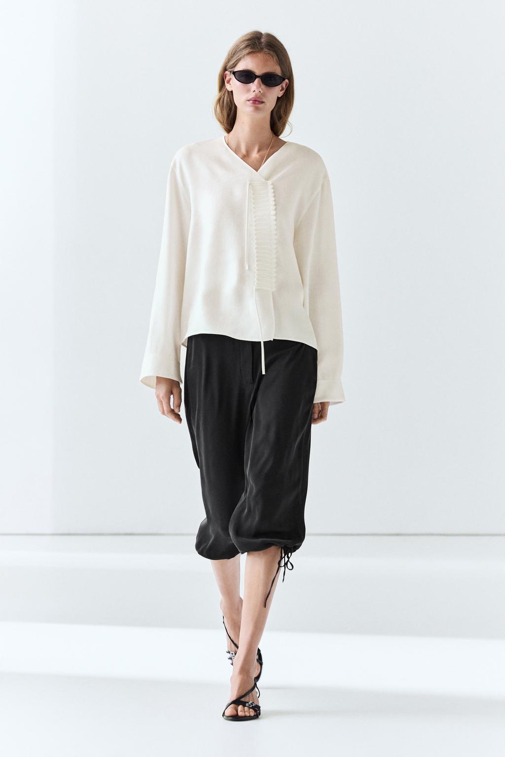Flowing linen blend blouse with button detail