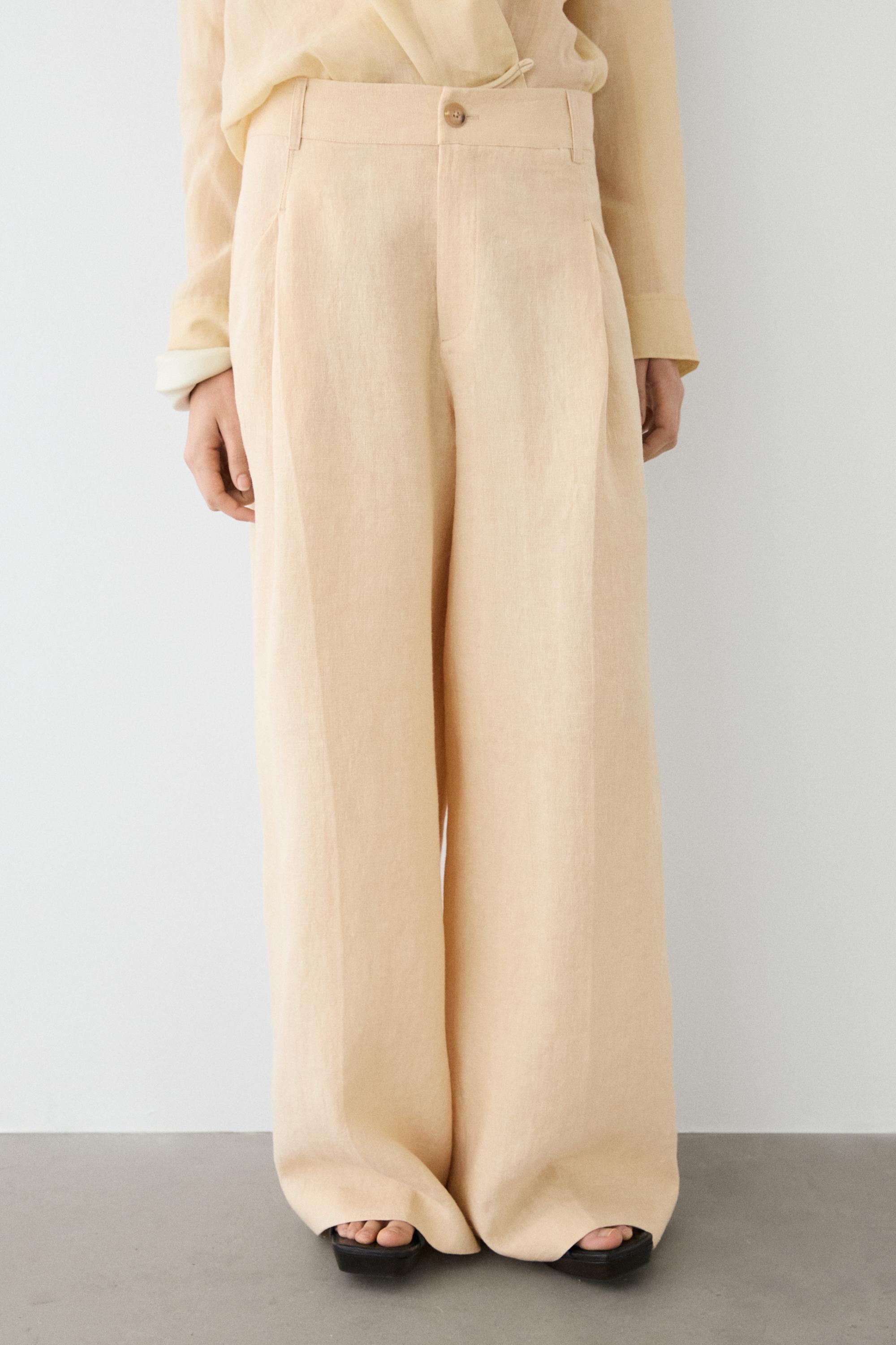 Wide-leg linen trousers with pocket detail — SAND