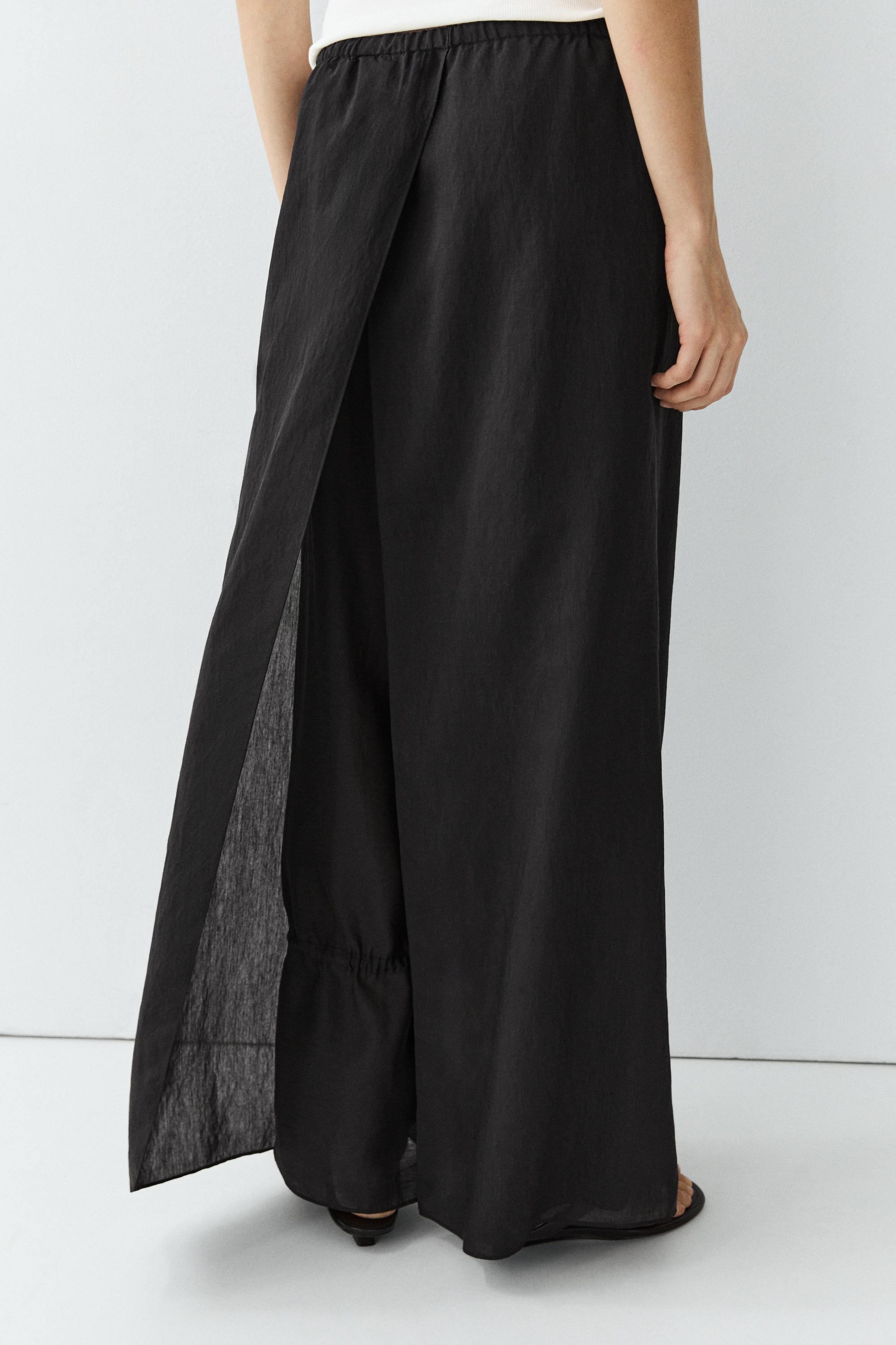 Double-layer pants with tie detail — BLACK