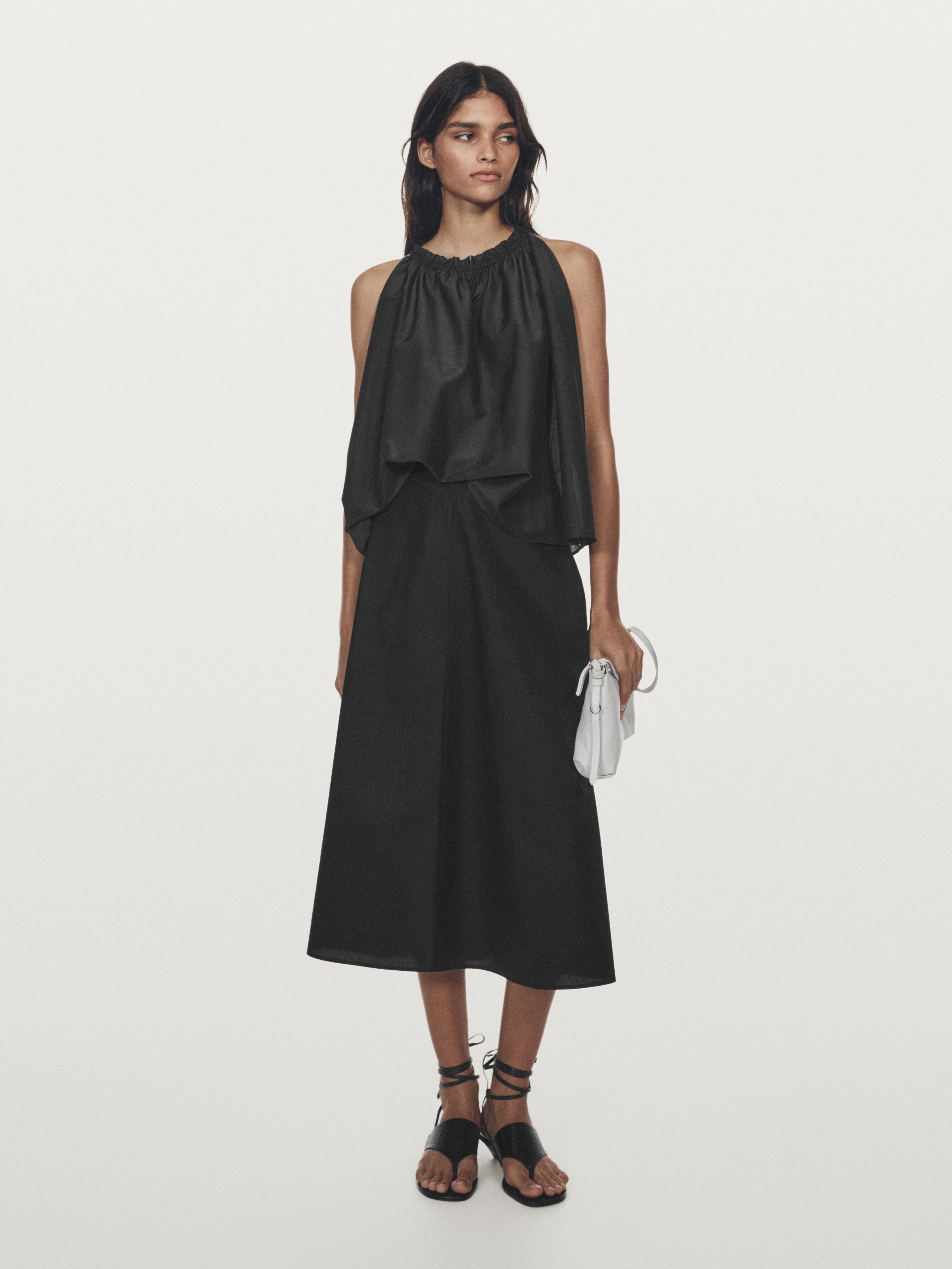 Falda midi detalle cinturilla