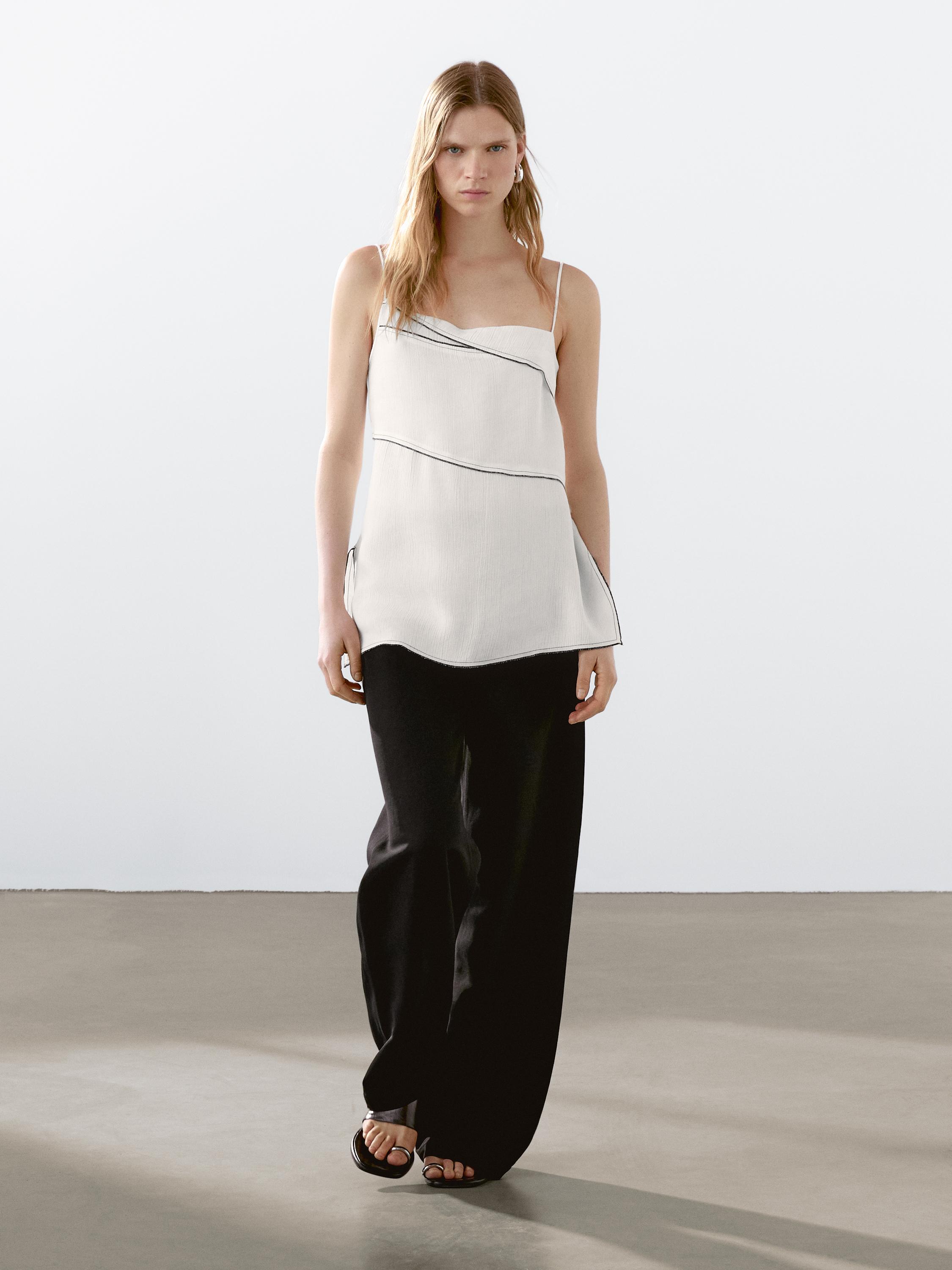 Flowing top with topstitching detail