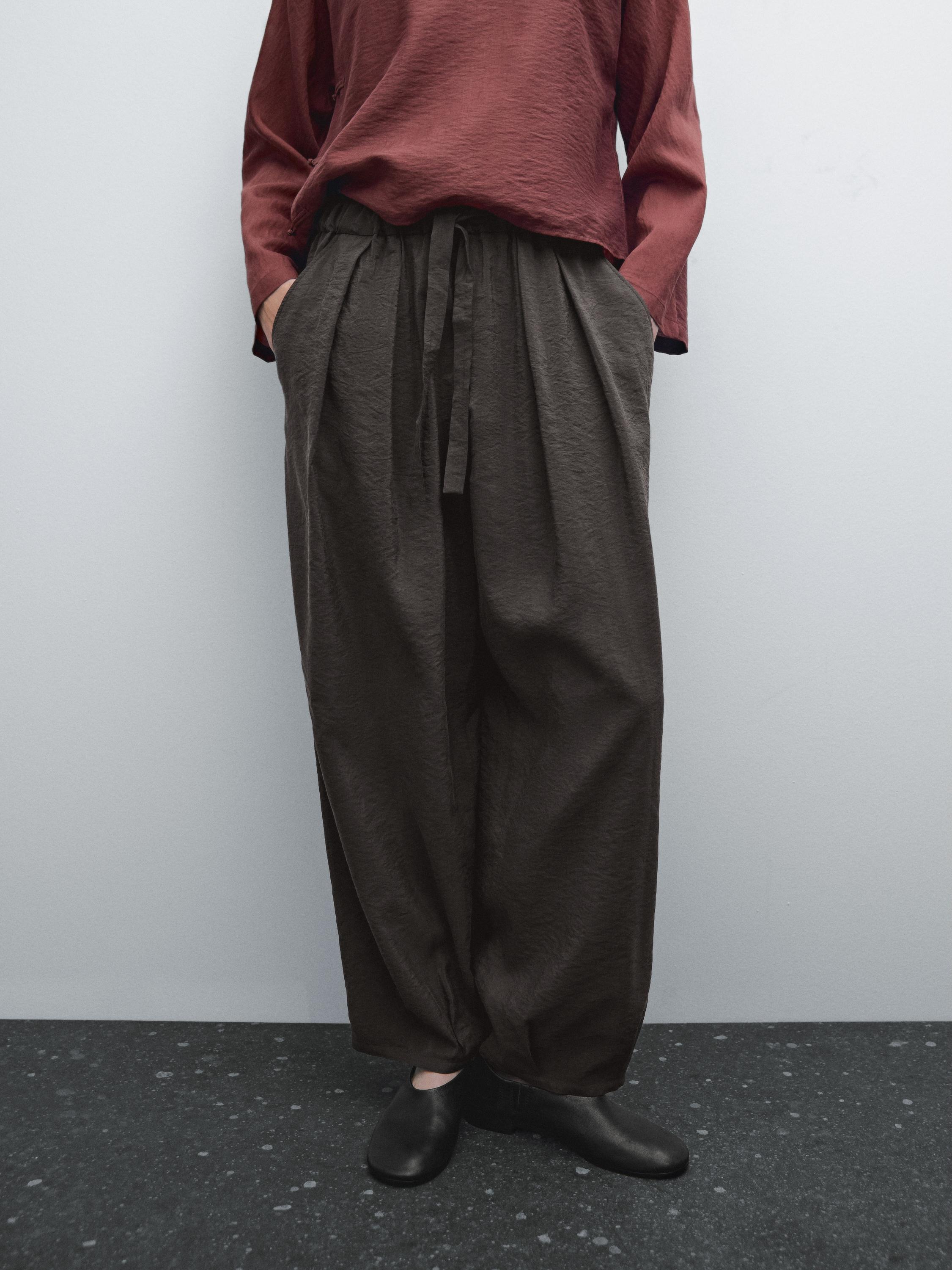 Voluminous silk blend trousers