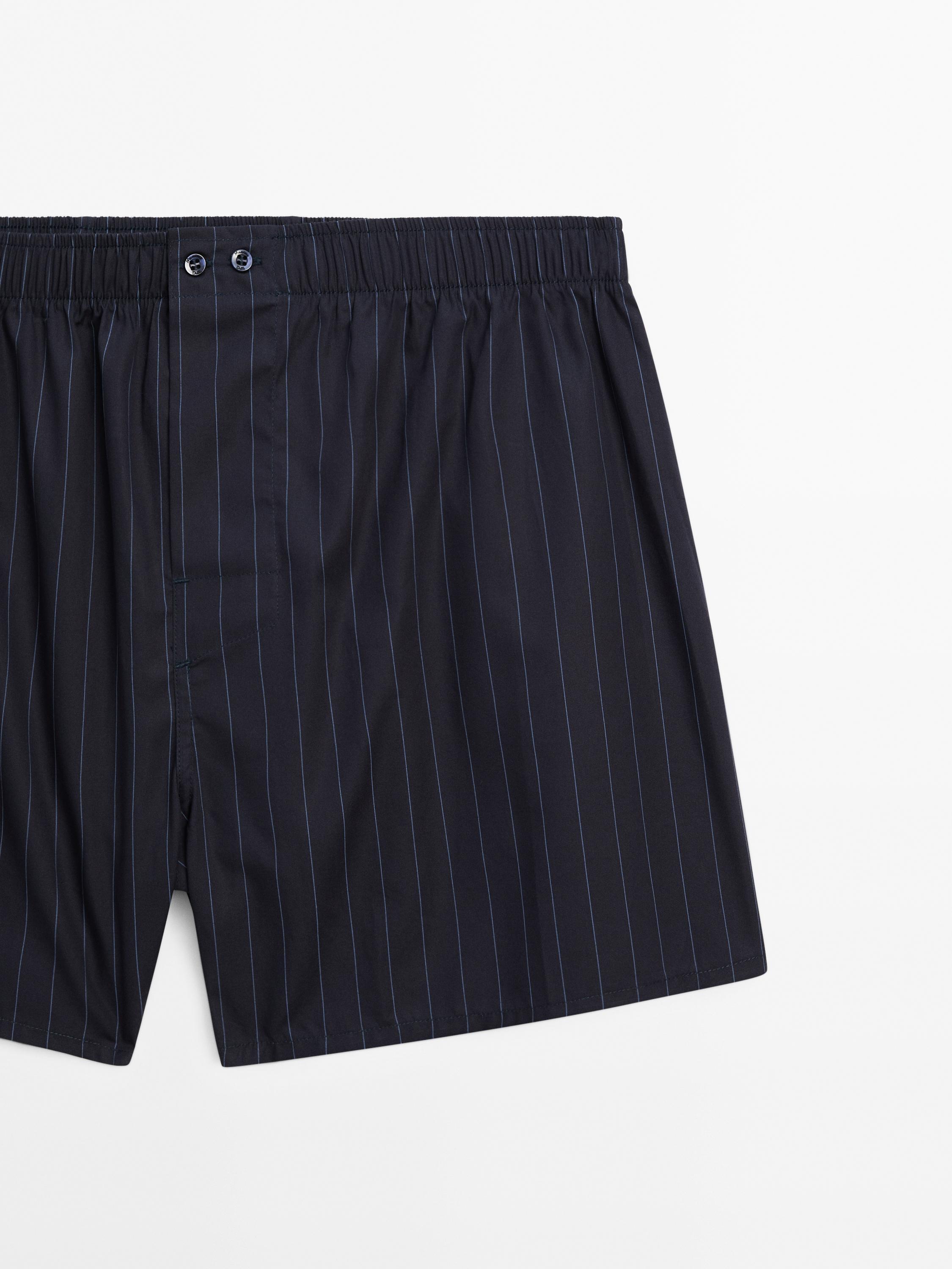 Gestreifter, marineblauer Popelinslip
