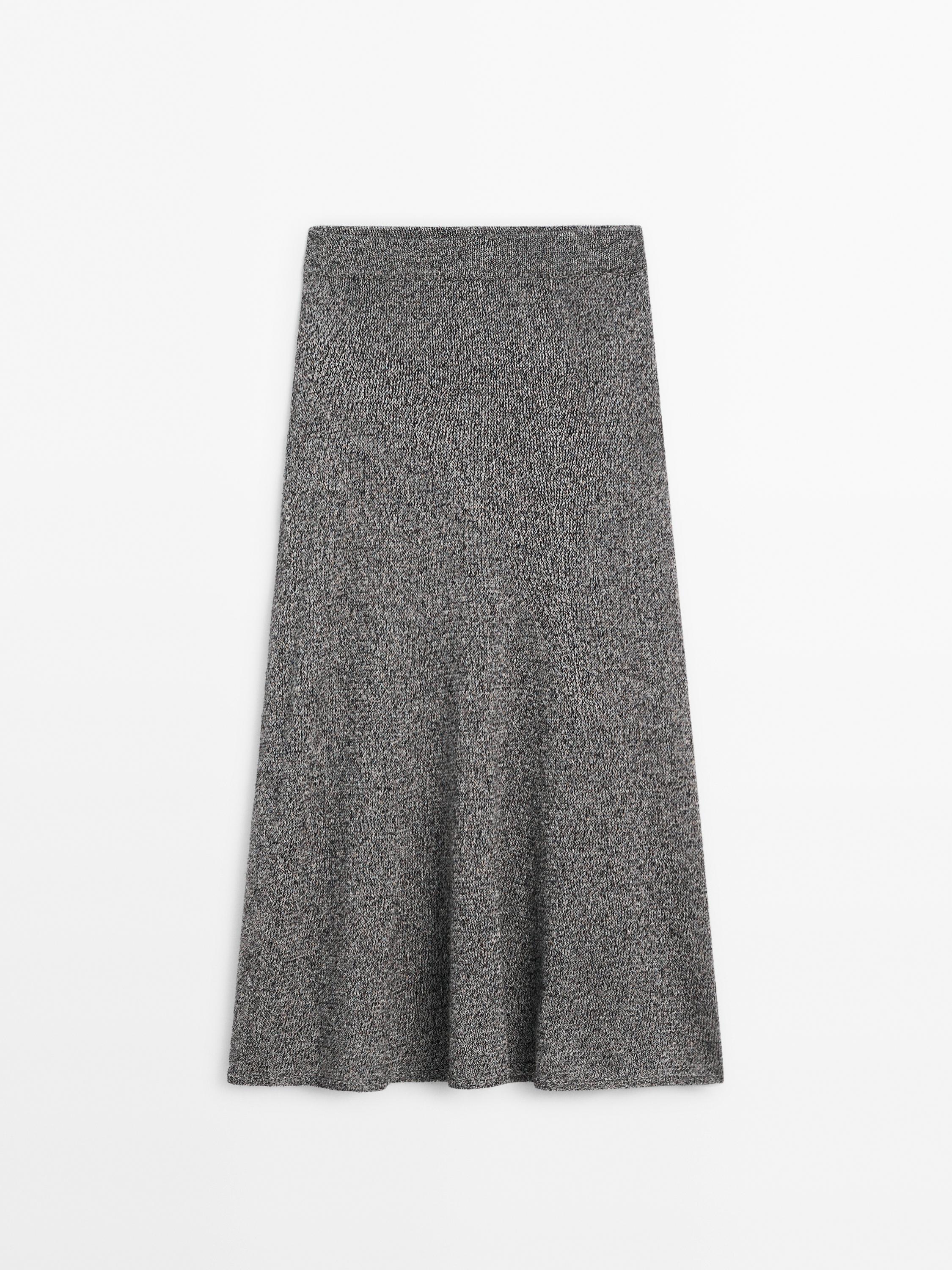 Falda punto midi evasé