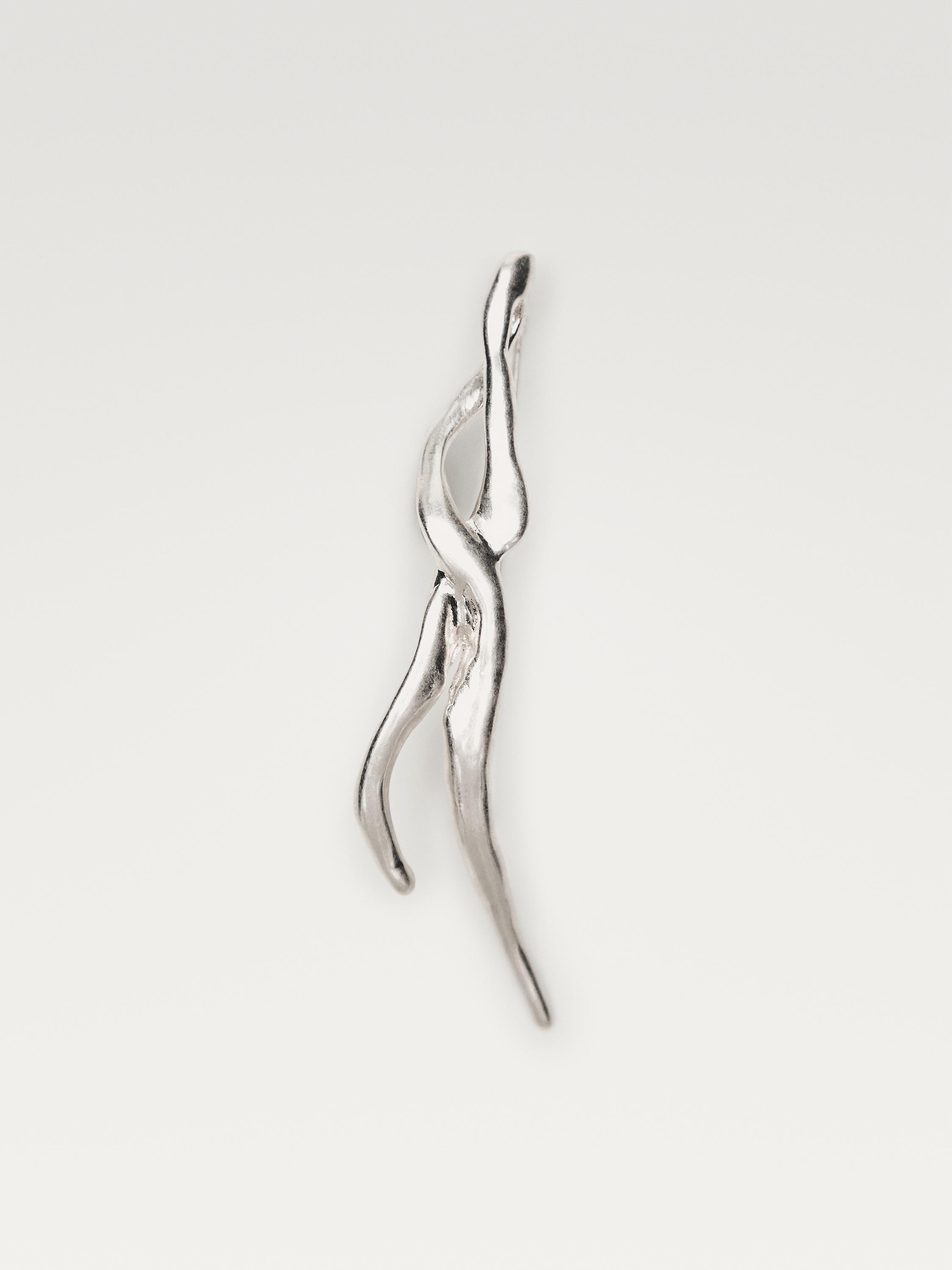 بروش تجريدي معدن