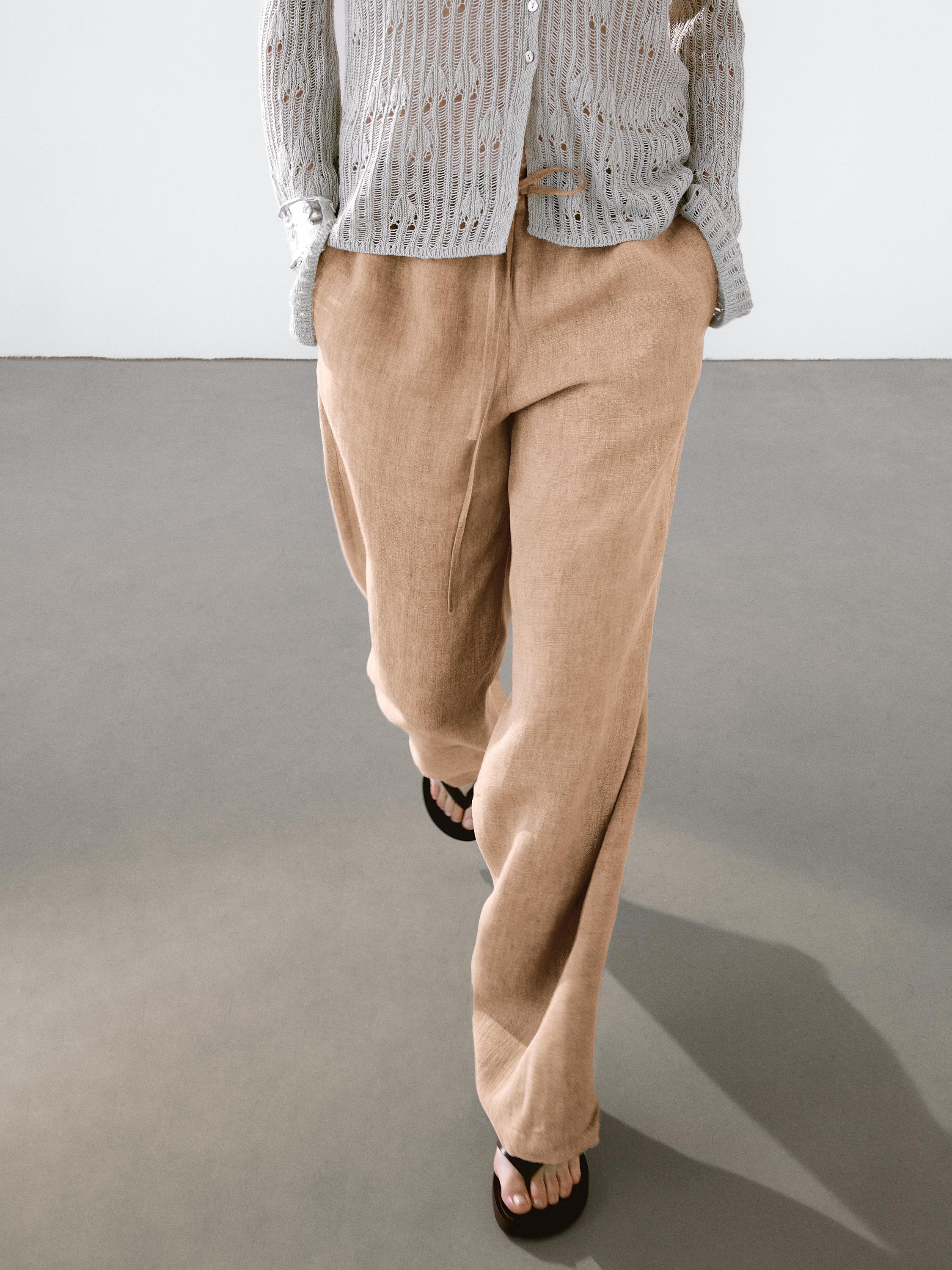 Linen suit trousers with frayed detail