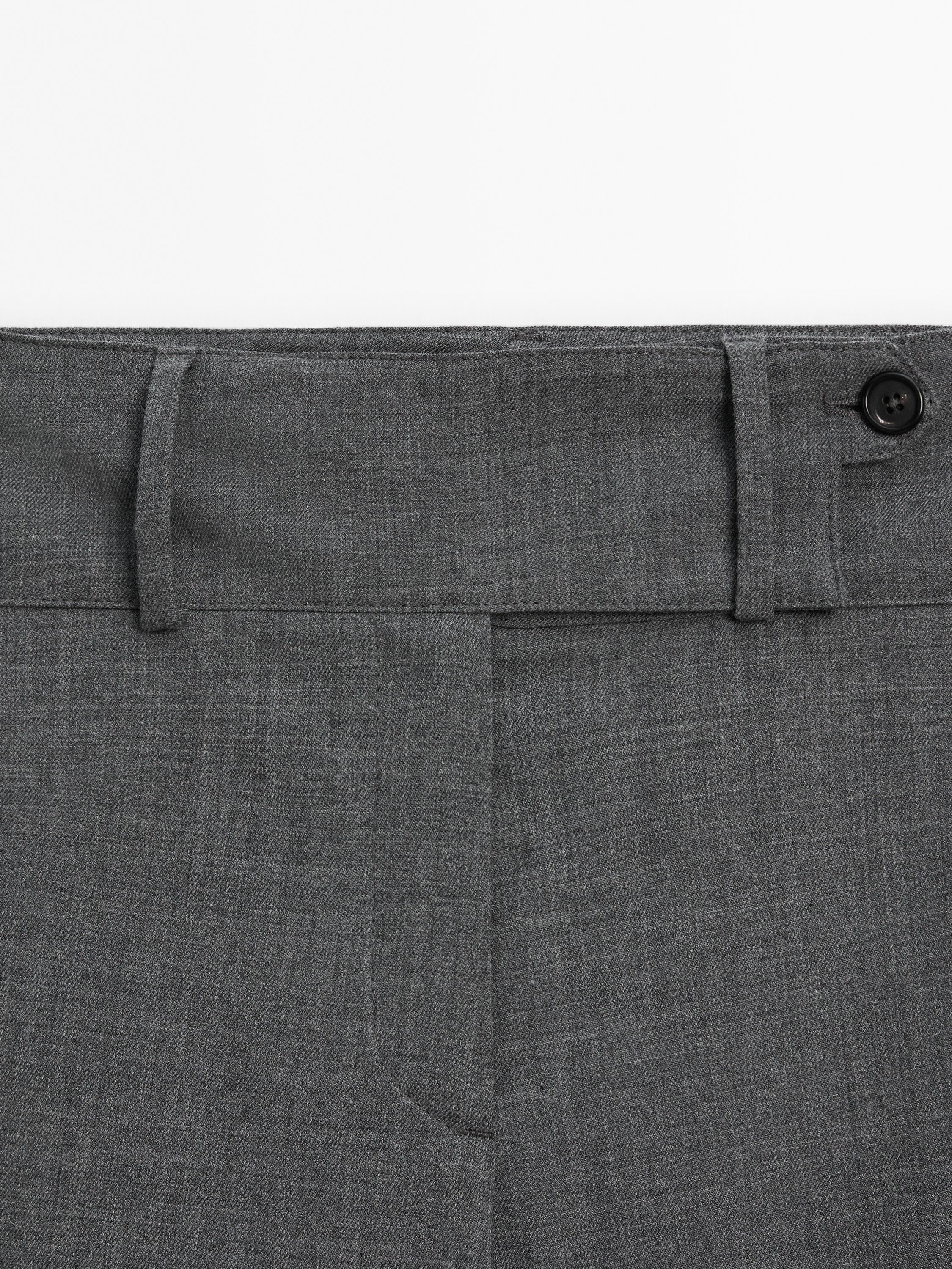 Straight trousers with wide waistband