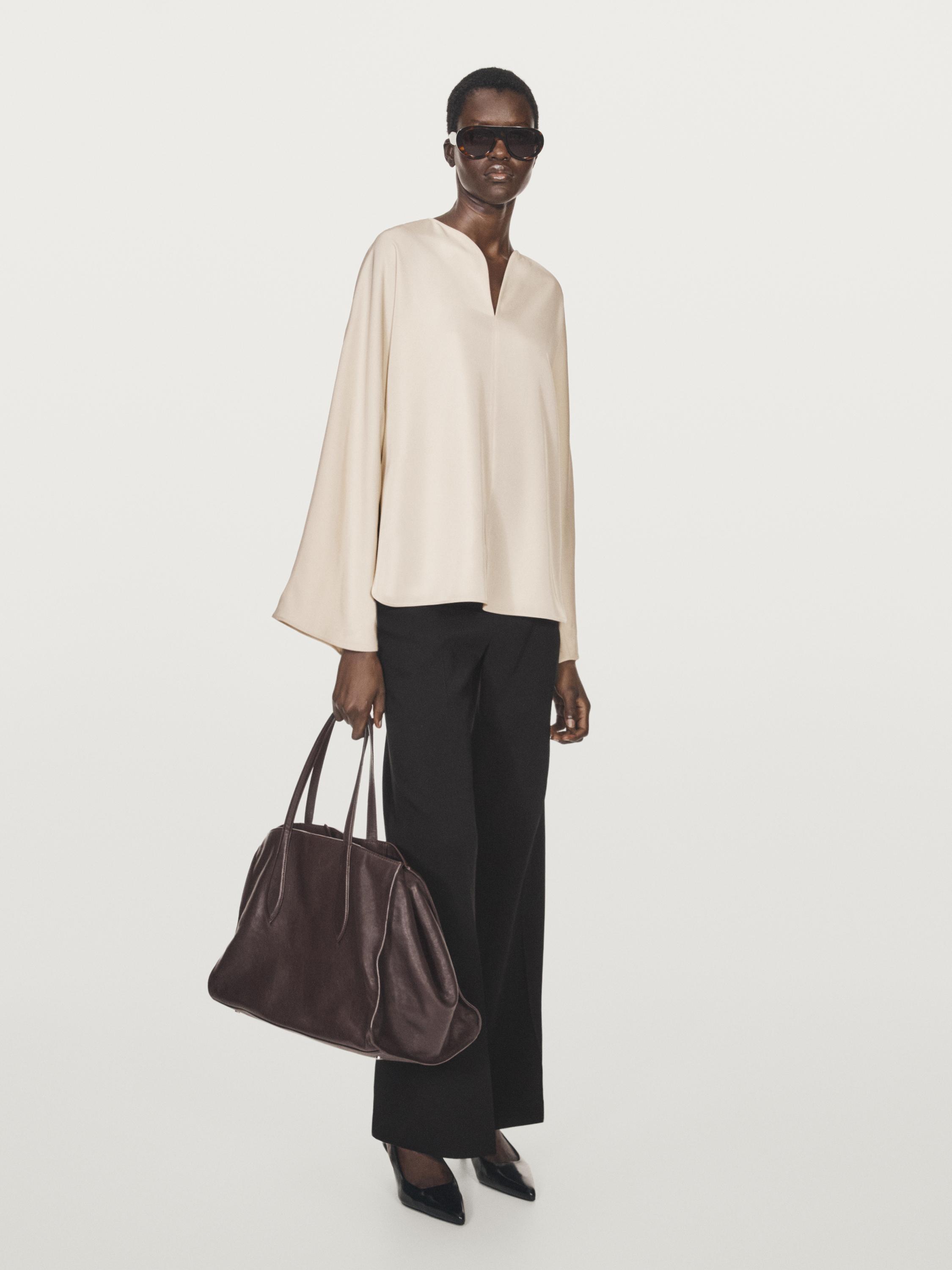Flowing blouse with slit details