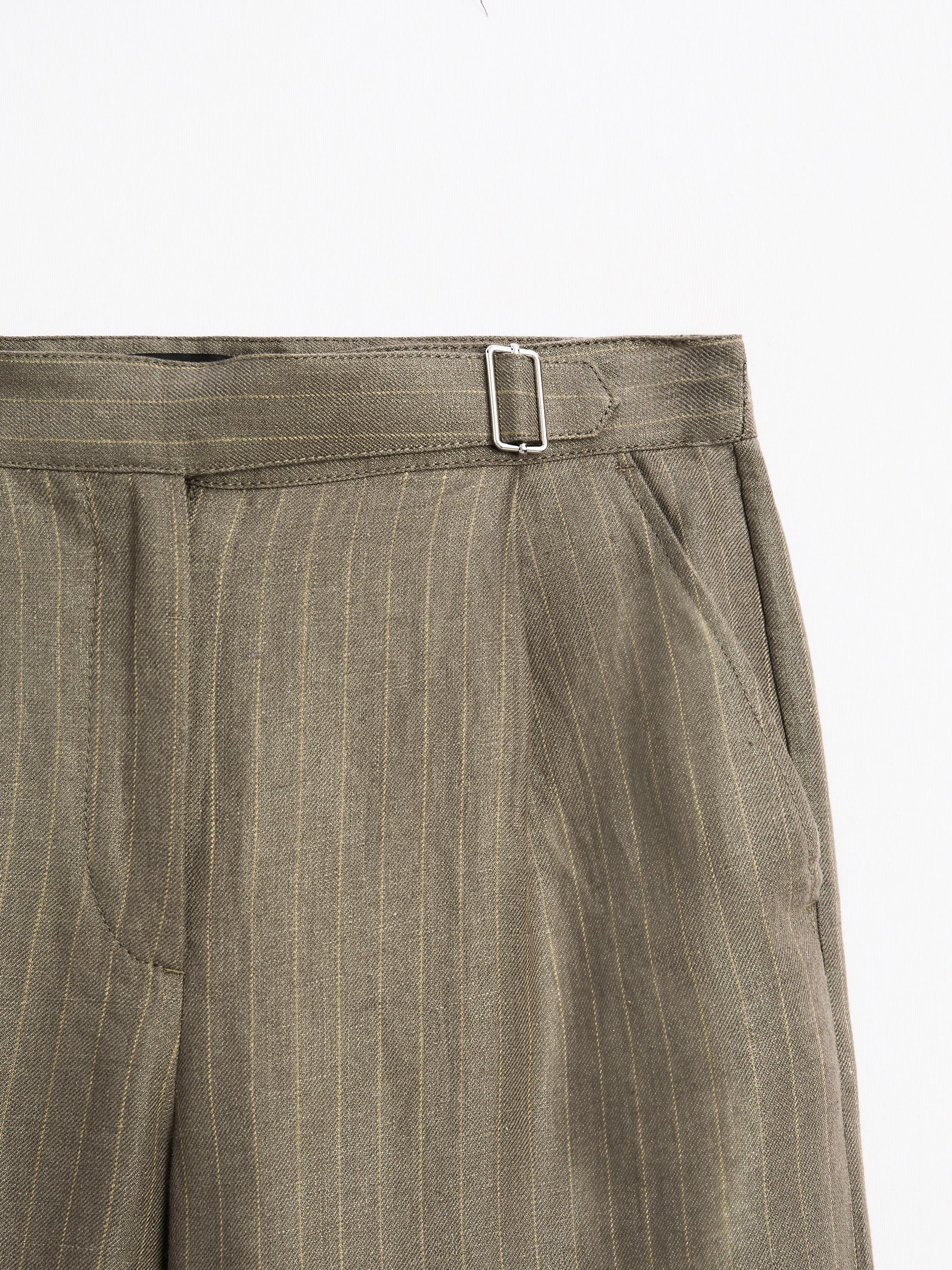 100% linen striped trousers with buckle detail