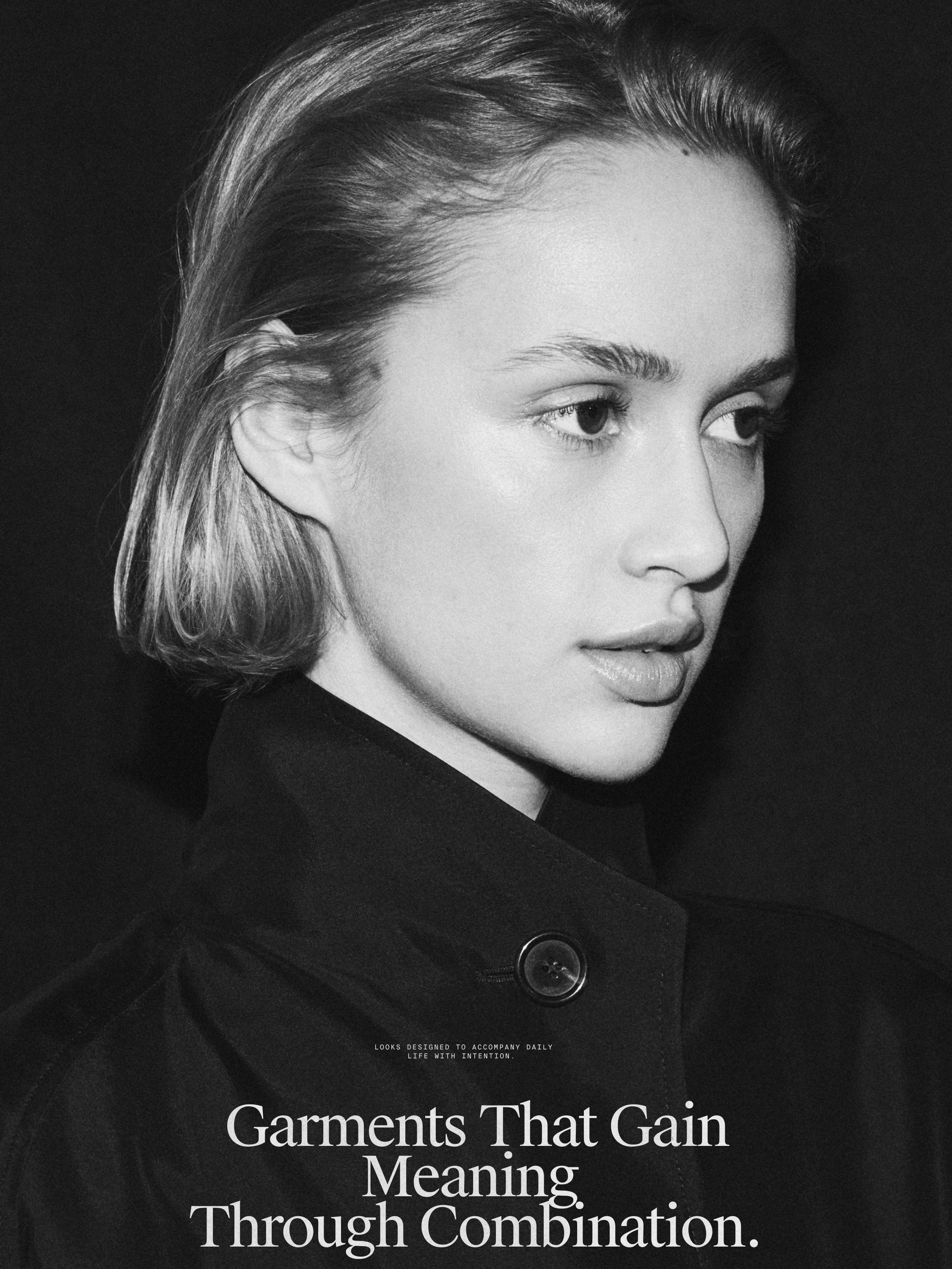Flowing voluminous cape with button details — BLACK