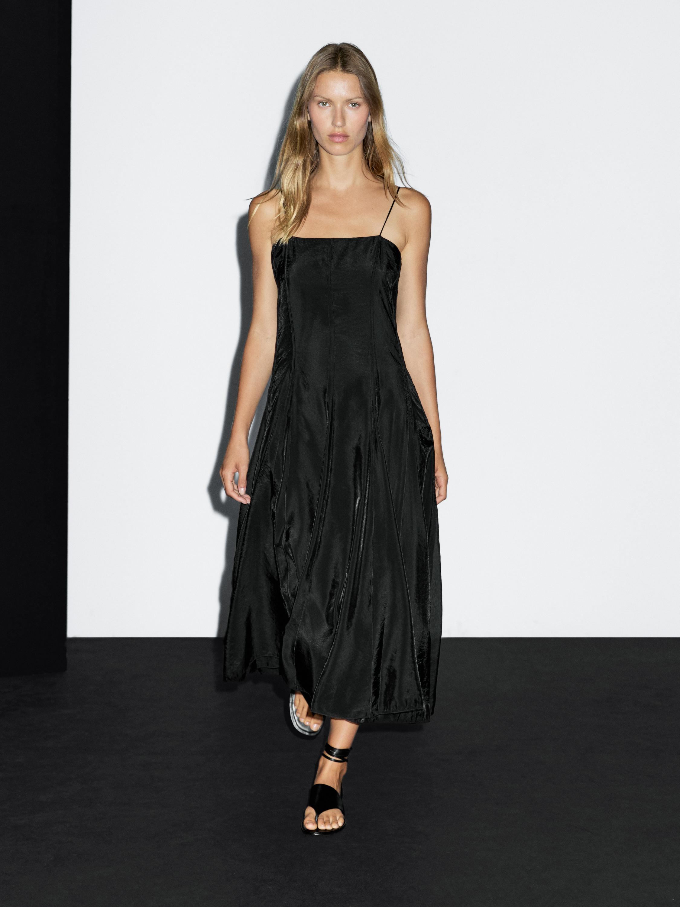 Vestit midi fluid detall godets