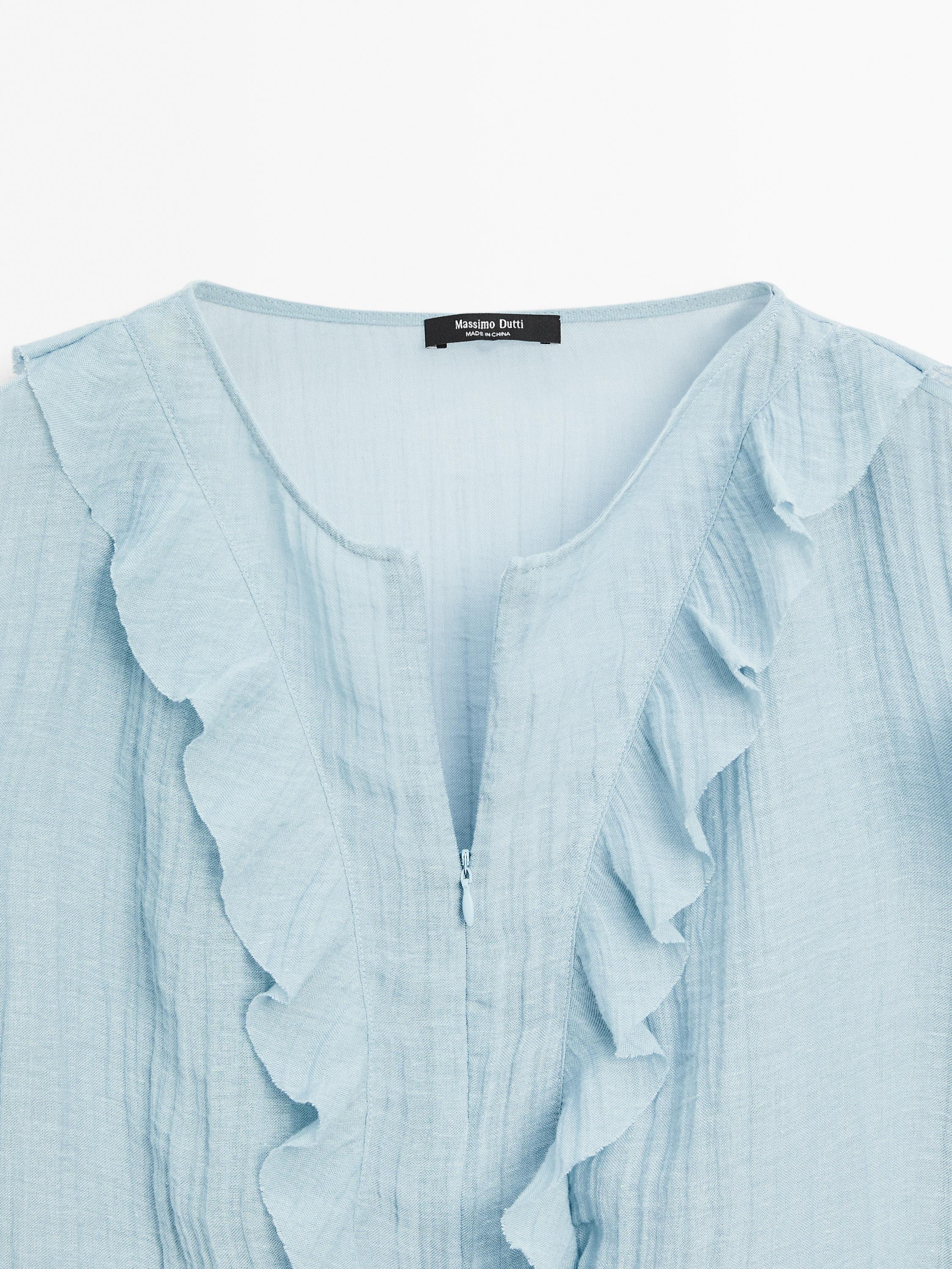 Flowing blouse with ruffles