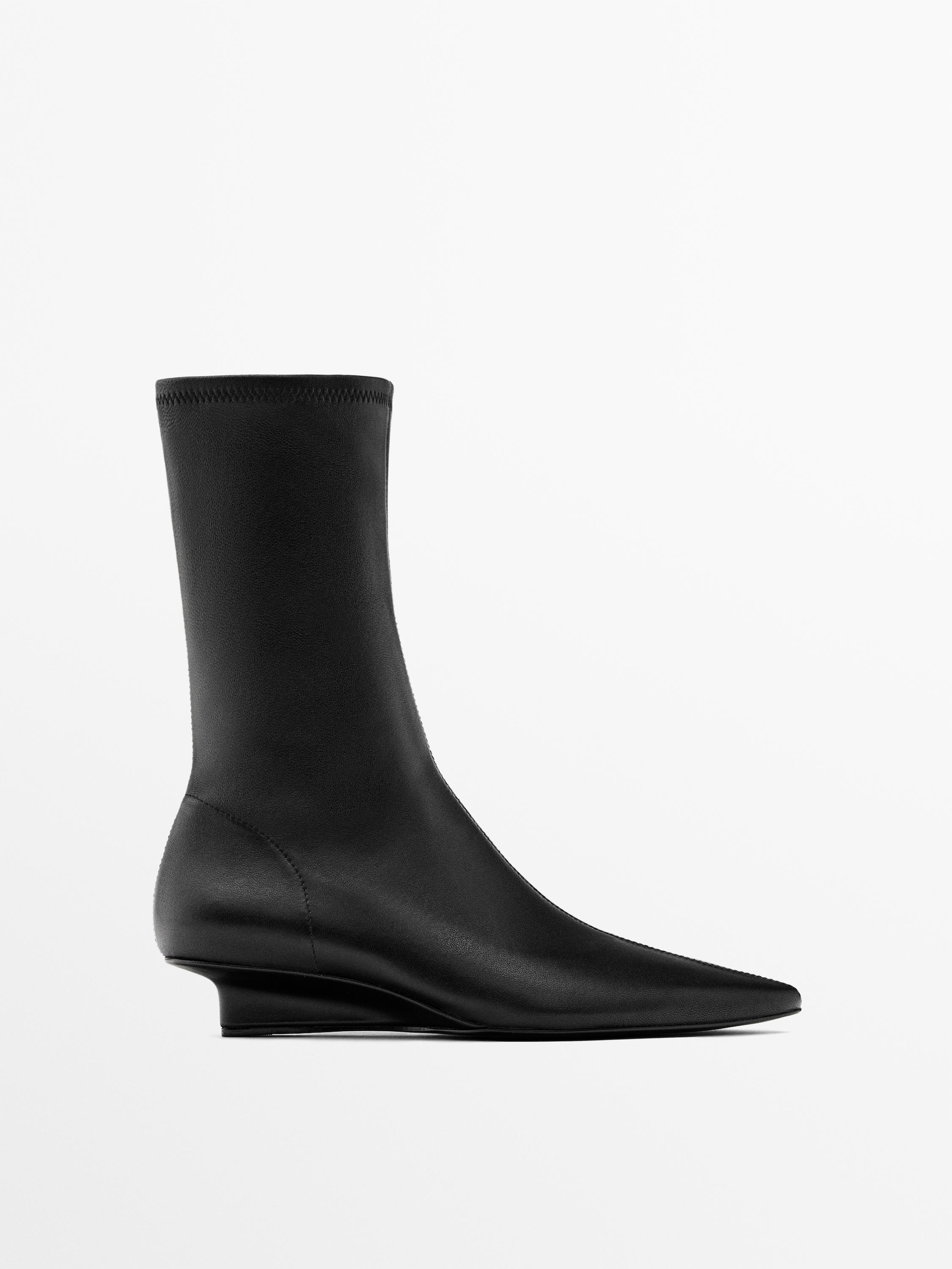 Stretch leather wedge ankle boots