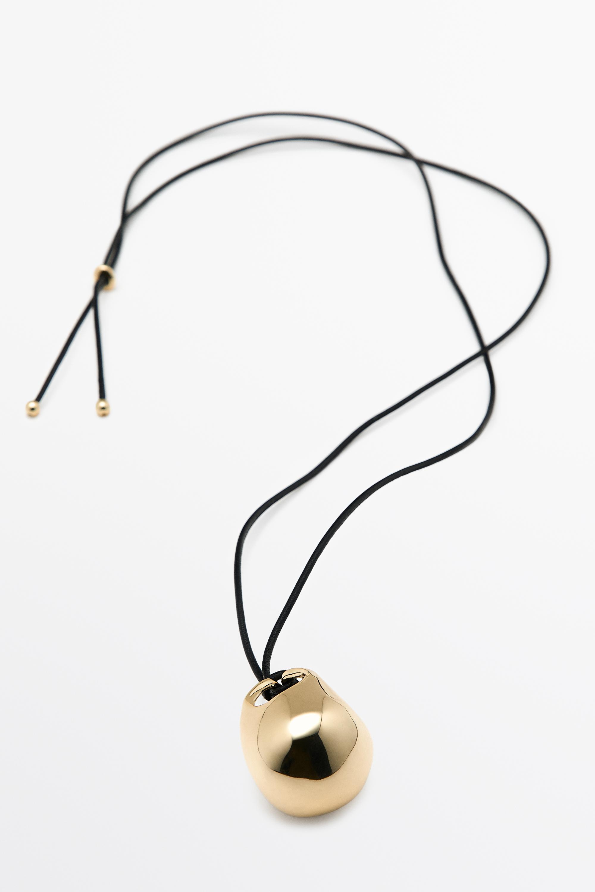 Oval bag pendant necklace — GOLDEN