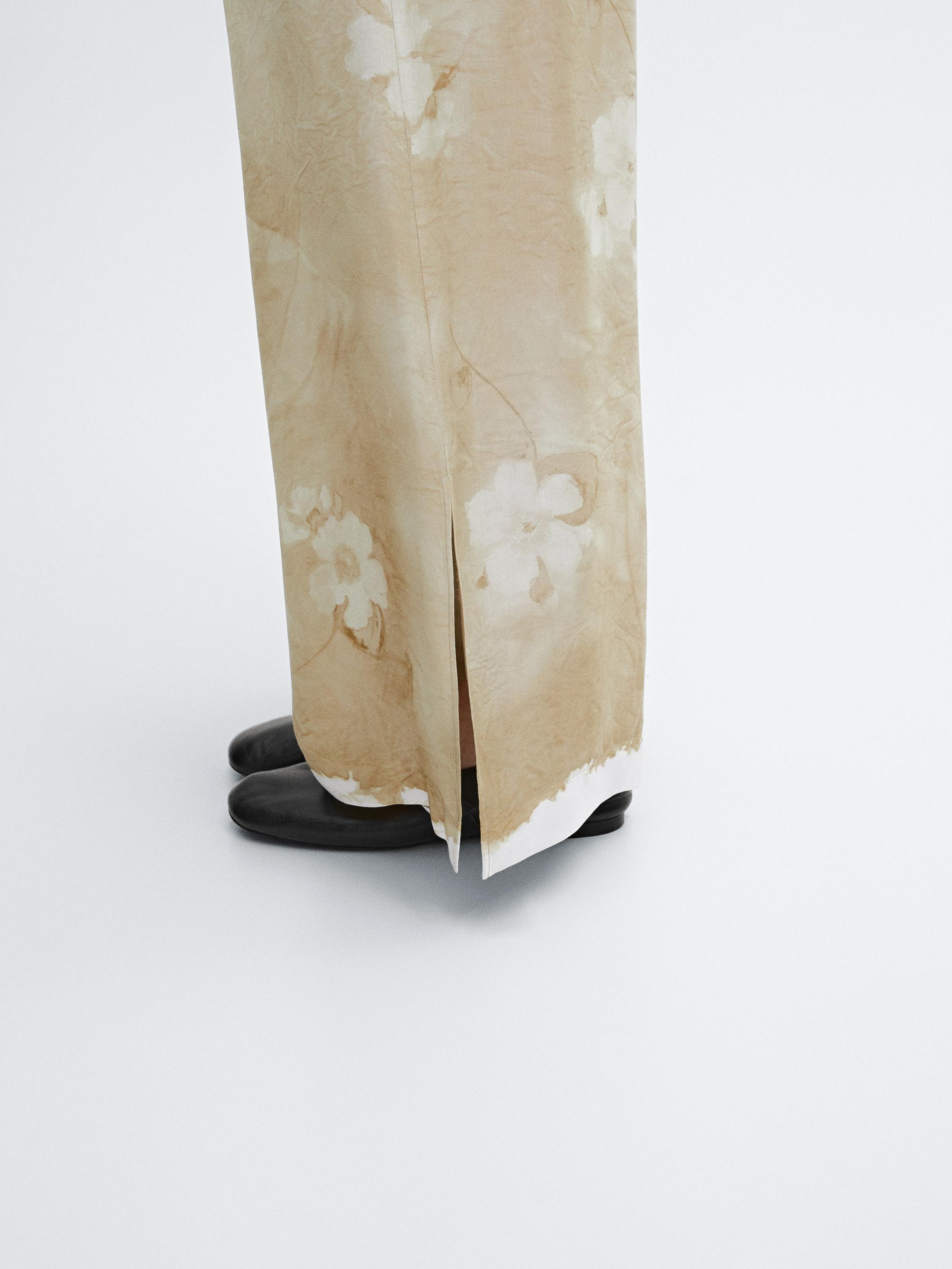 Flowing printed trousers with drawstring detail