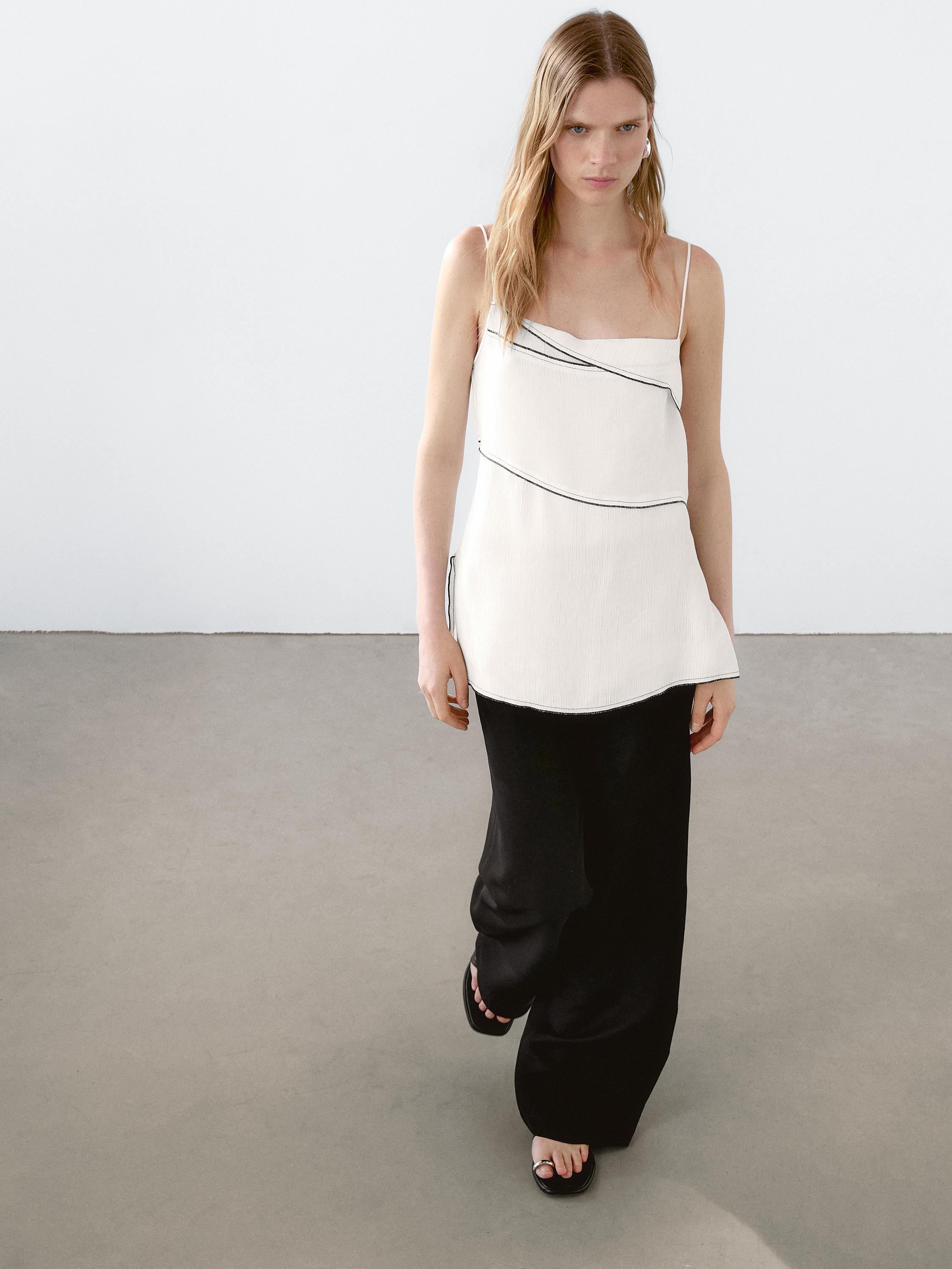 Flowing top with topstitching detail