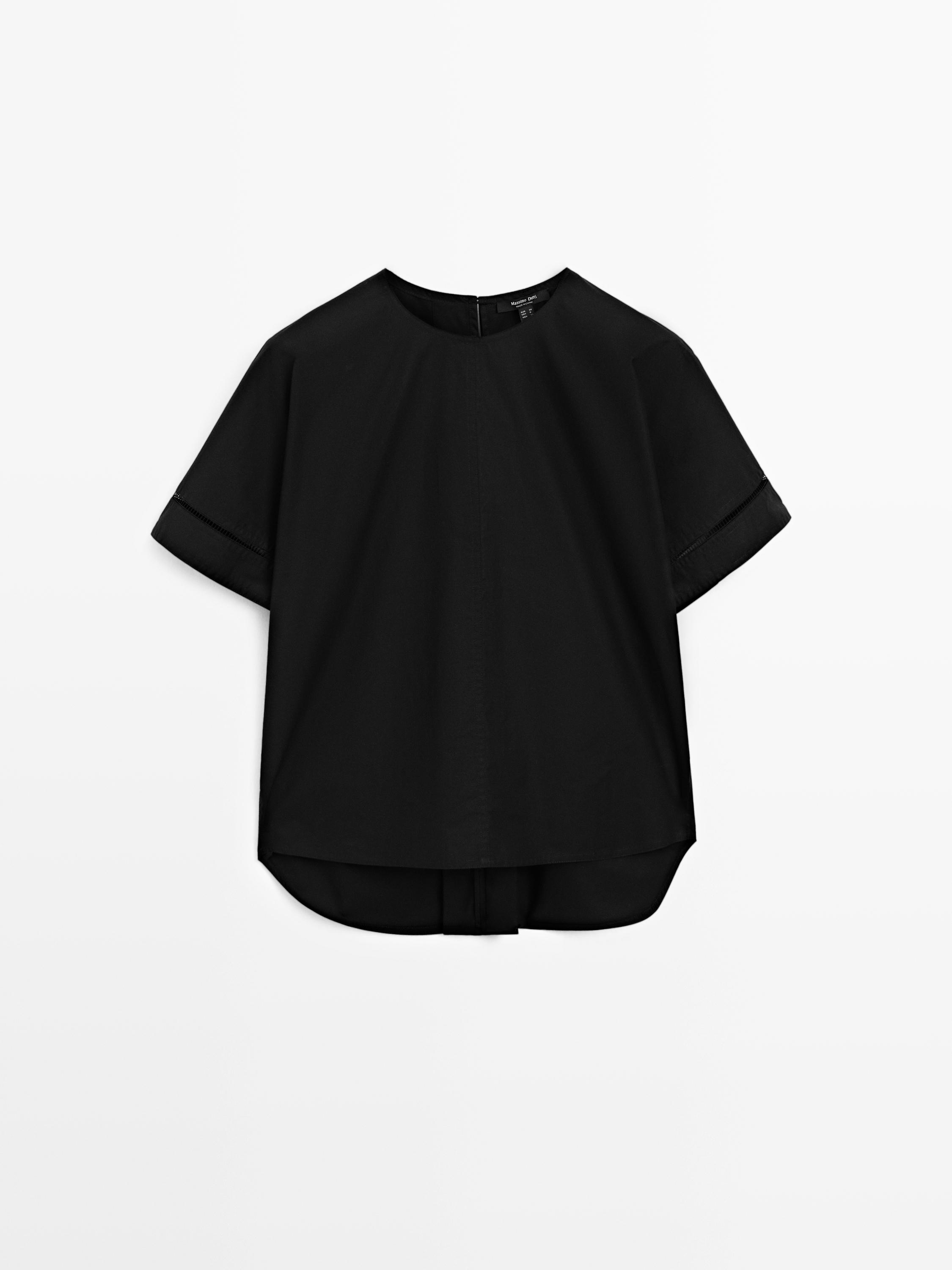 Blusa holgada detalle manga