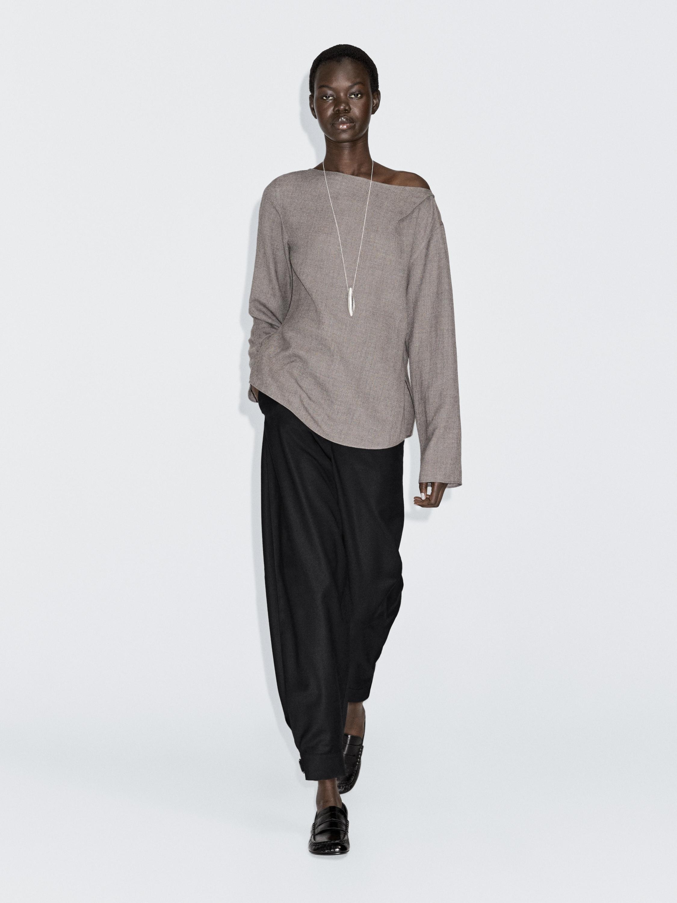 Blusa cuello barco con lana