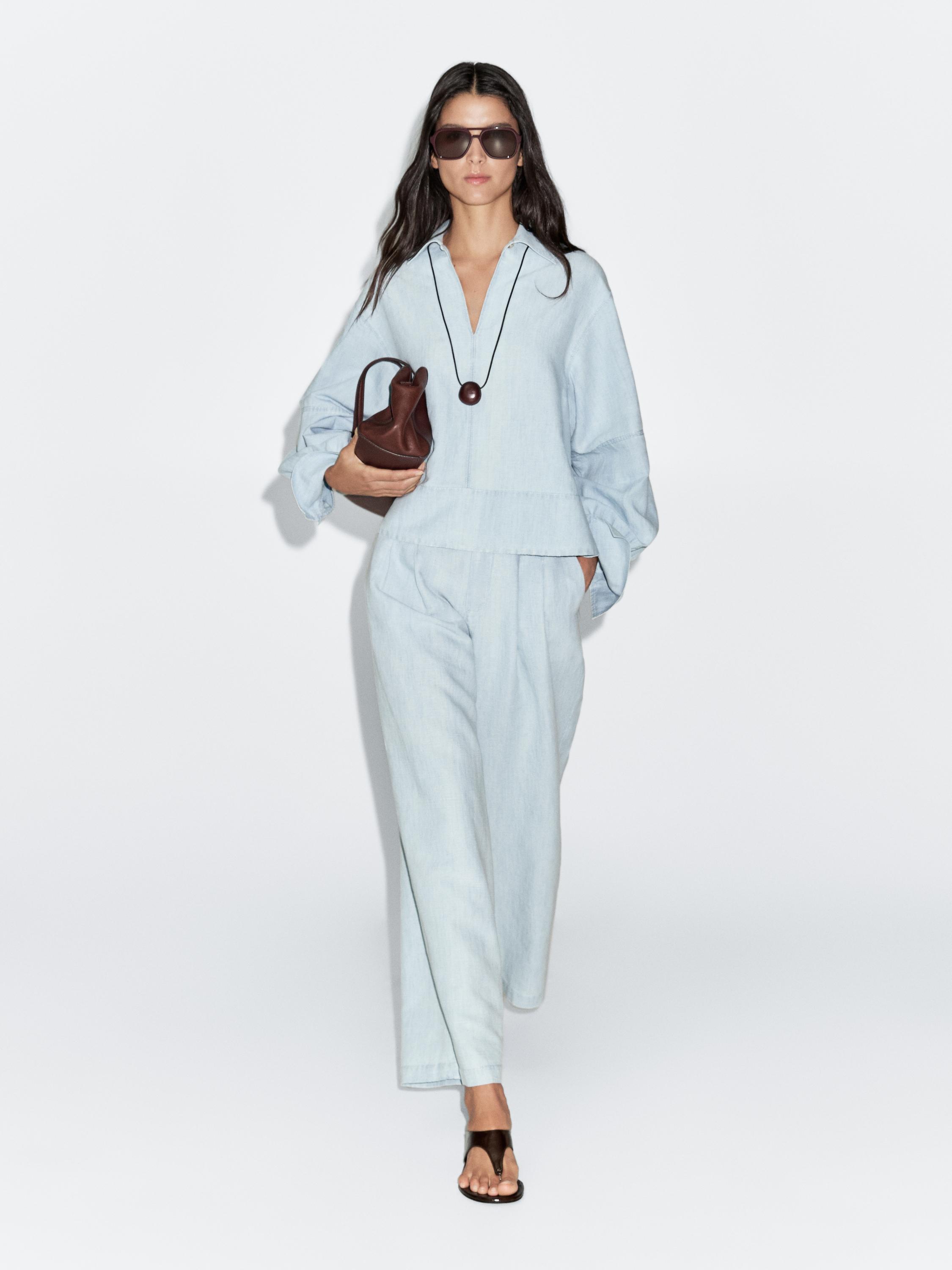 Oversize denim blouse with puff sleeves