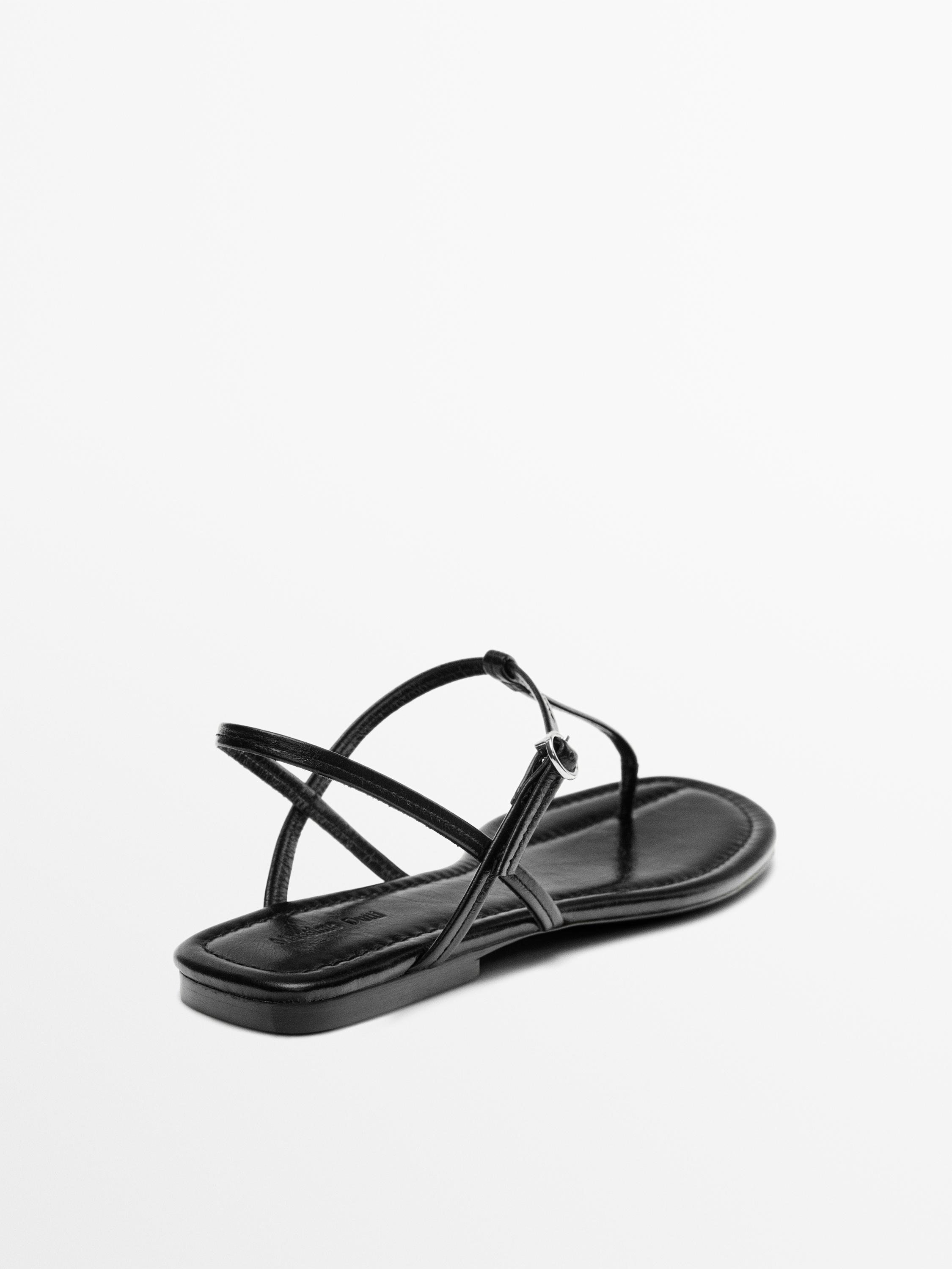Strappy flat sandals with toe divider — BLACK