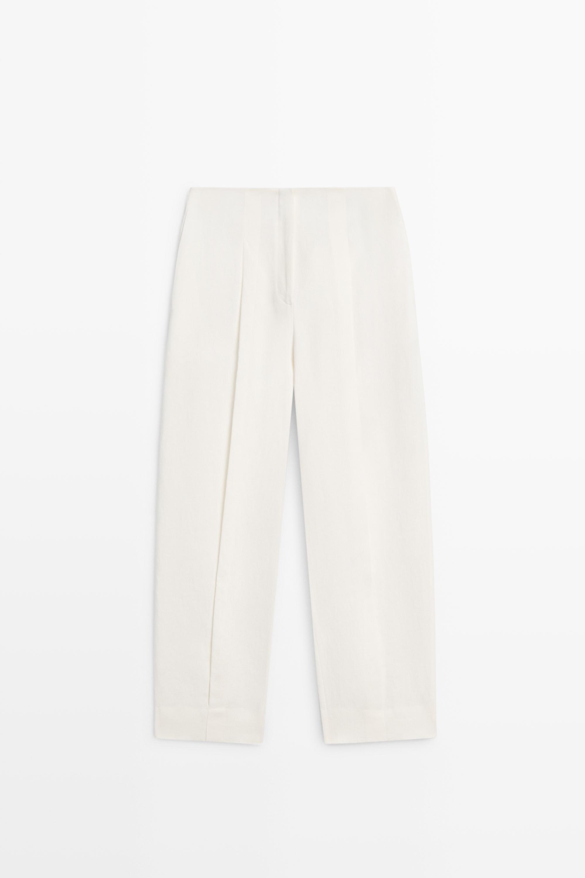 Pantalón detalle pinzas puño bajo lino