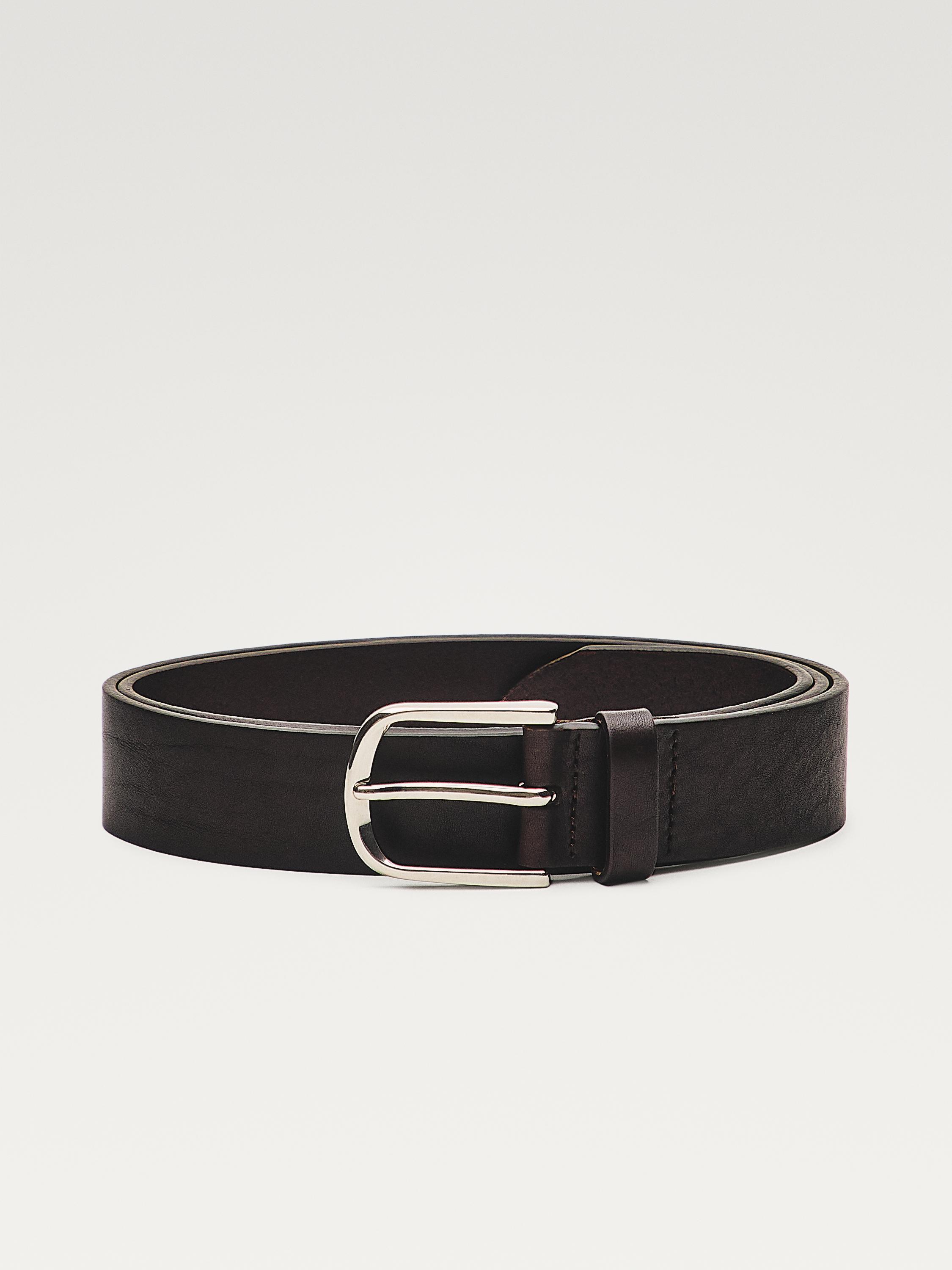 Front view of a brown belt with a silver metal buckle.