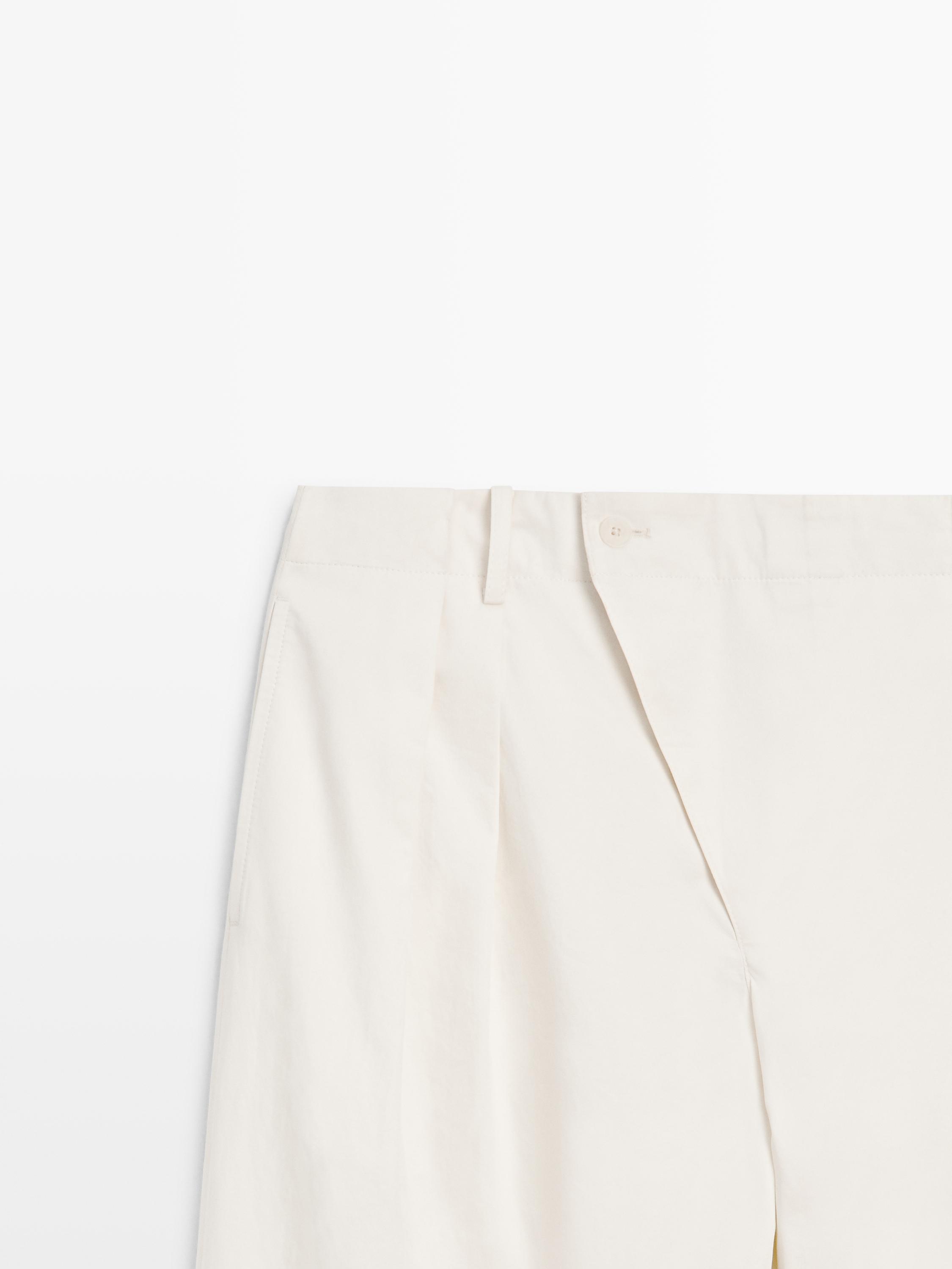 Pantalon à plis avec fermeture croisée - STUDIO