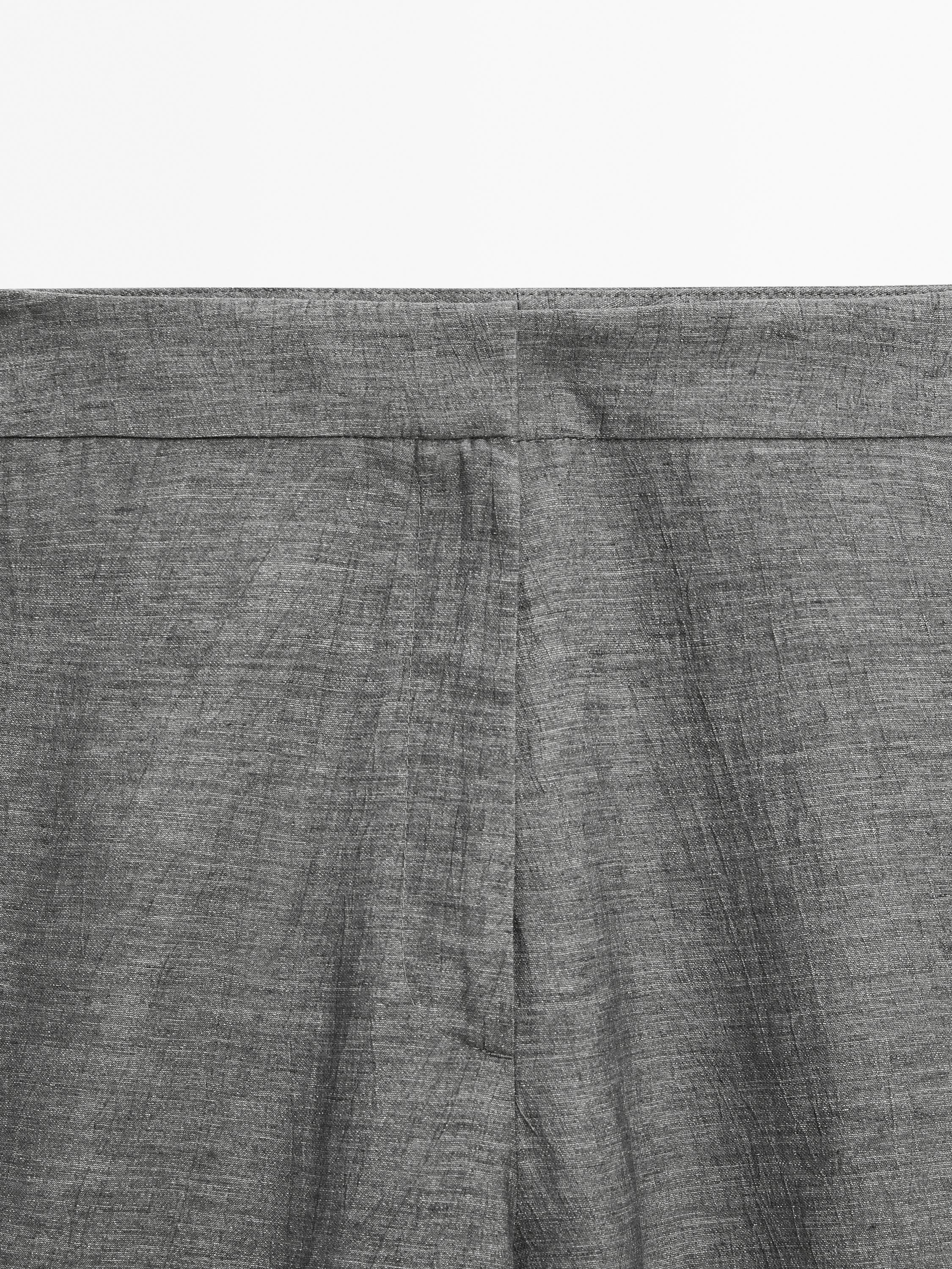 Balloon fit trousers with button details