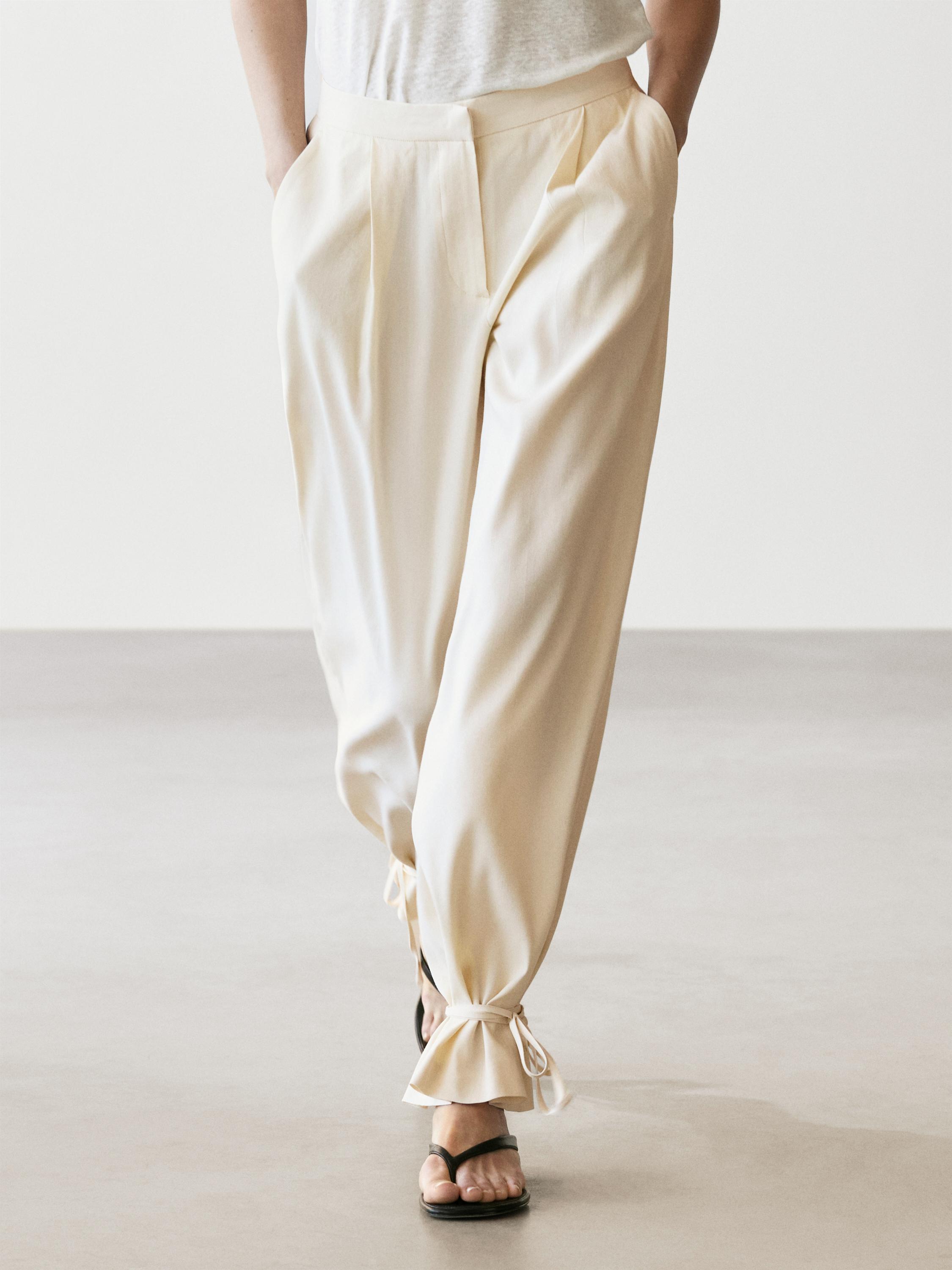Flowing barrel fit trousers — CREAM