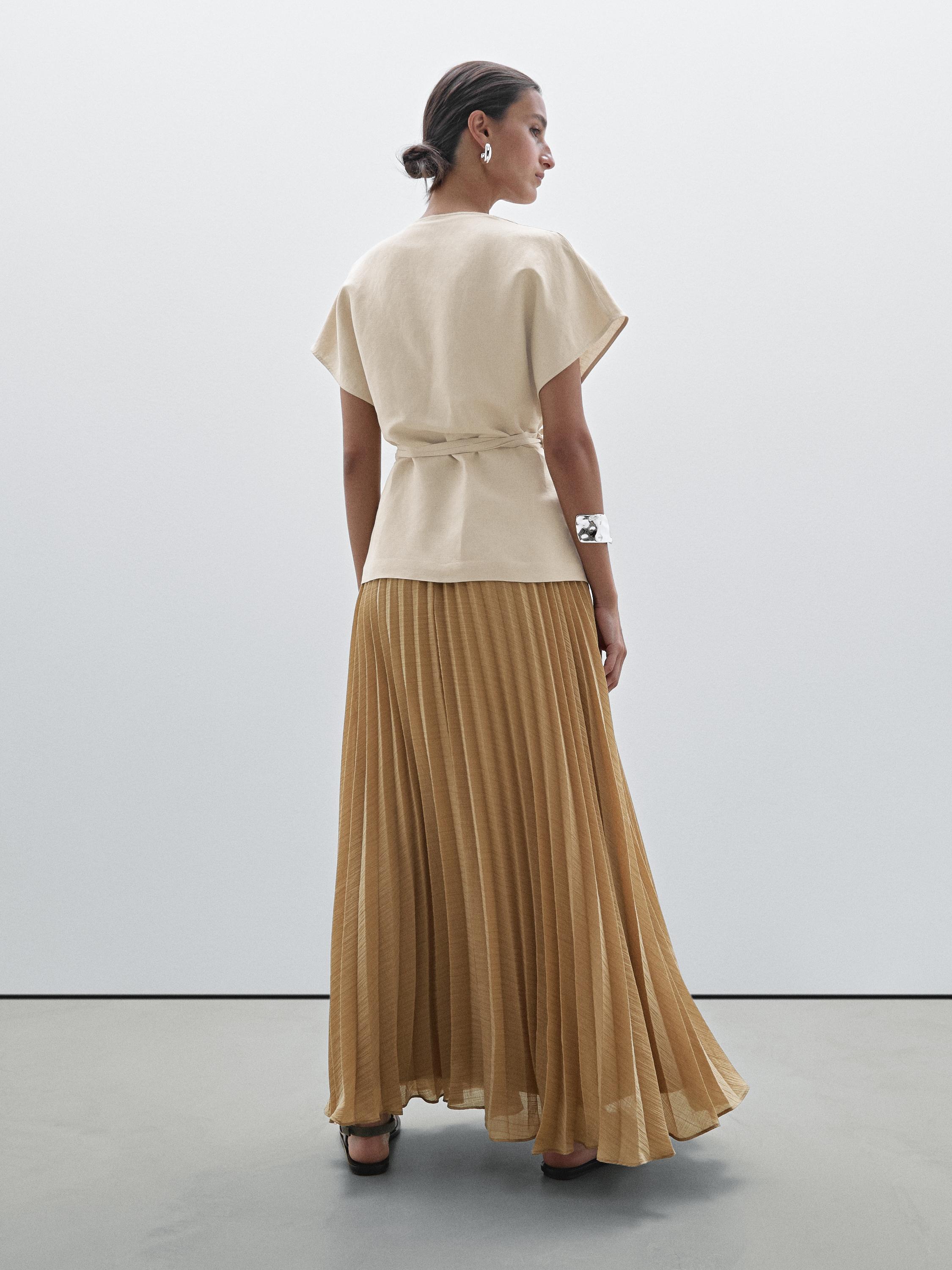 Long pleated dress with waistcoat detail