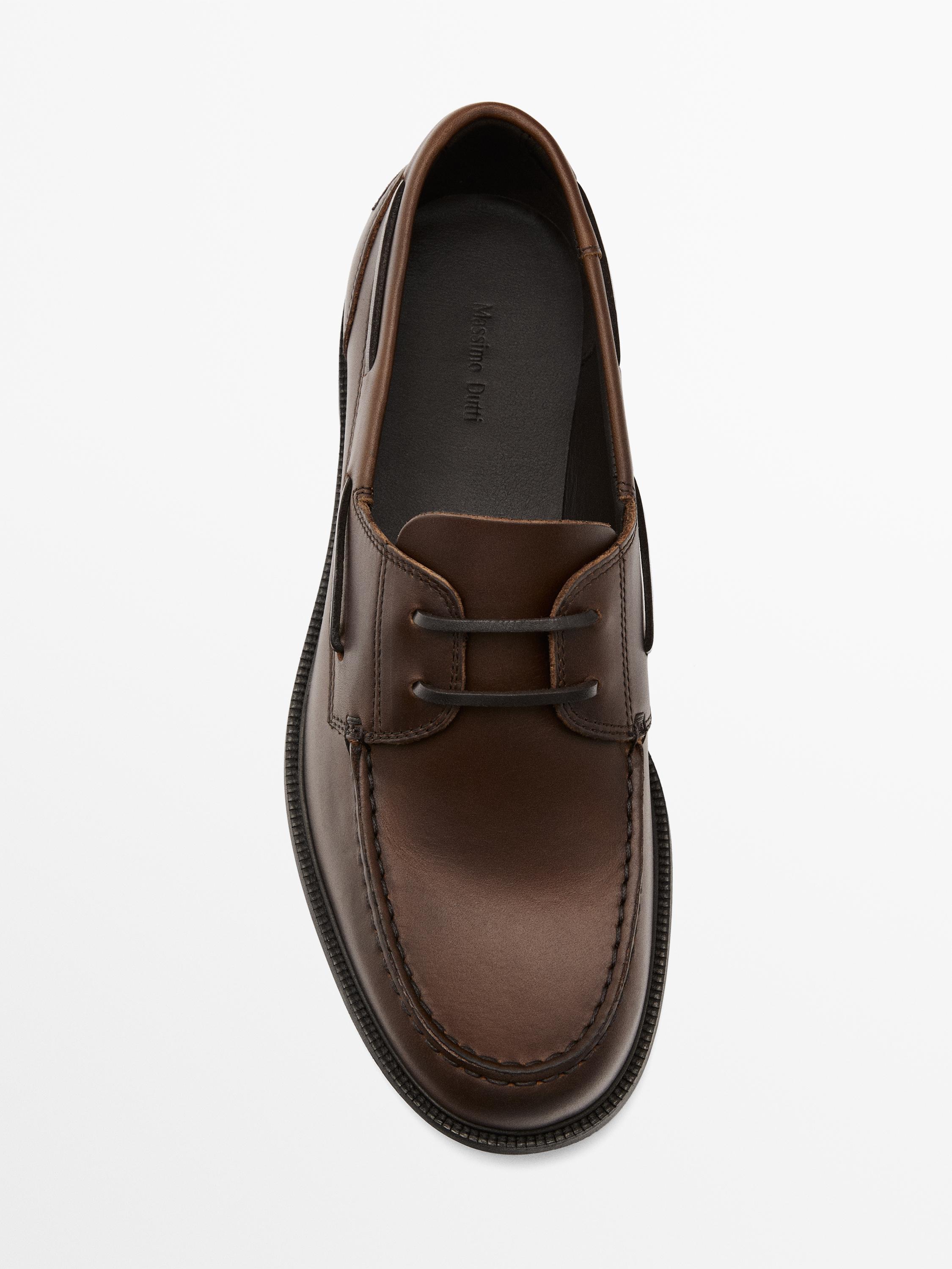 Oiled leather deck shoes
