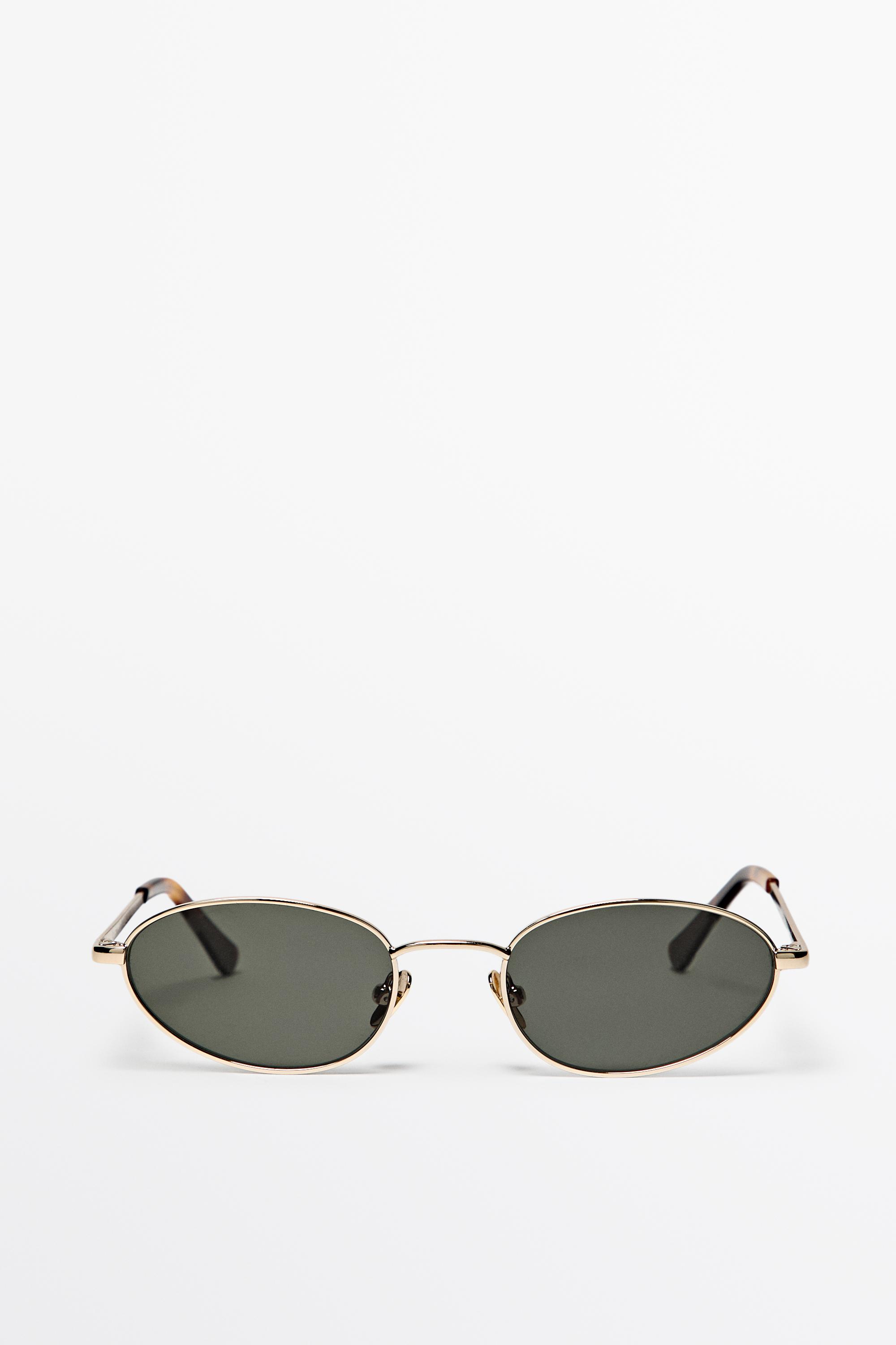 Oval metal sunglasses — GOLDEN