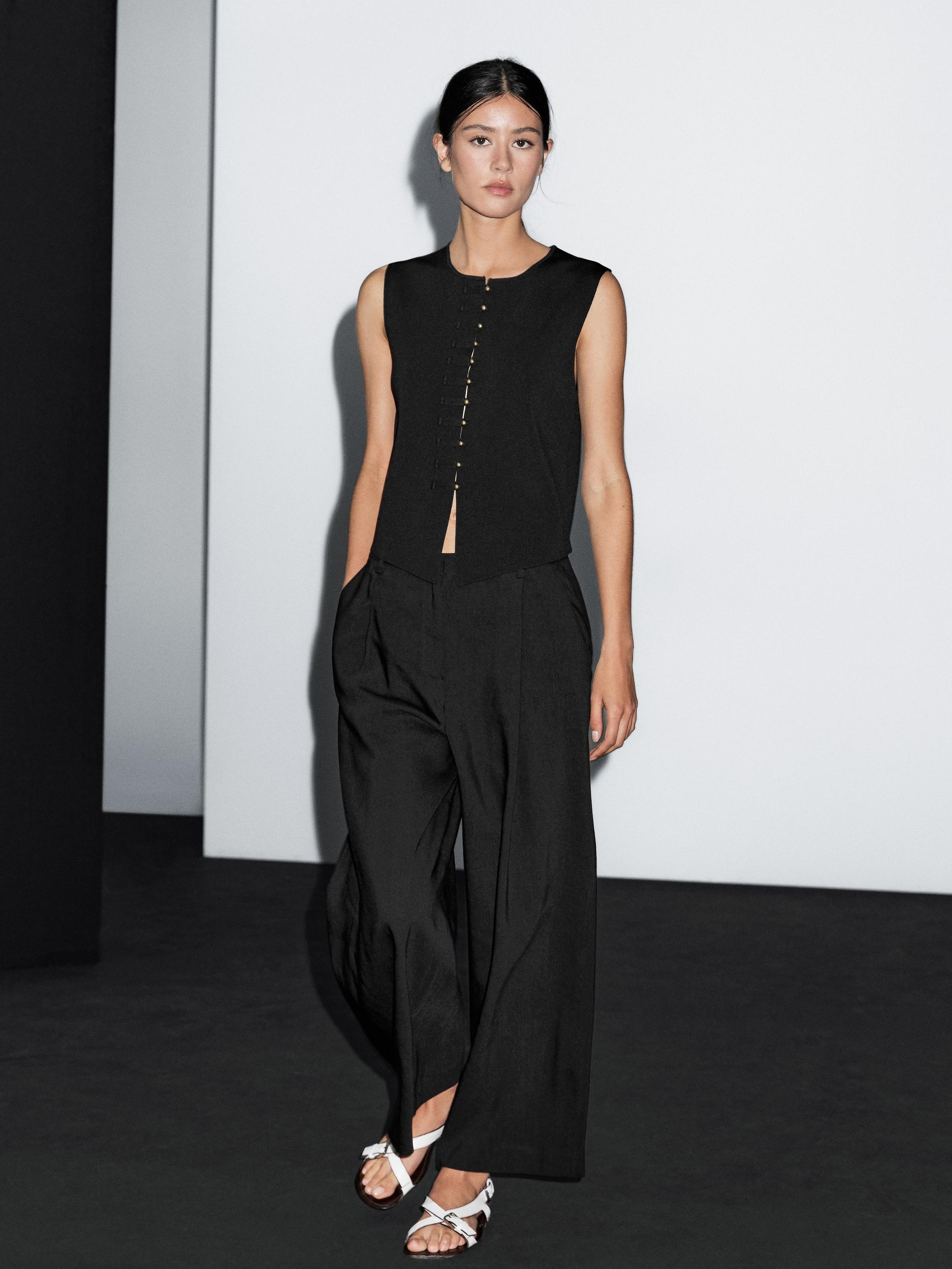 Veste sans manches en maille boutons fantaisie · Noir · Pulls