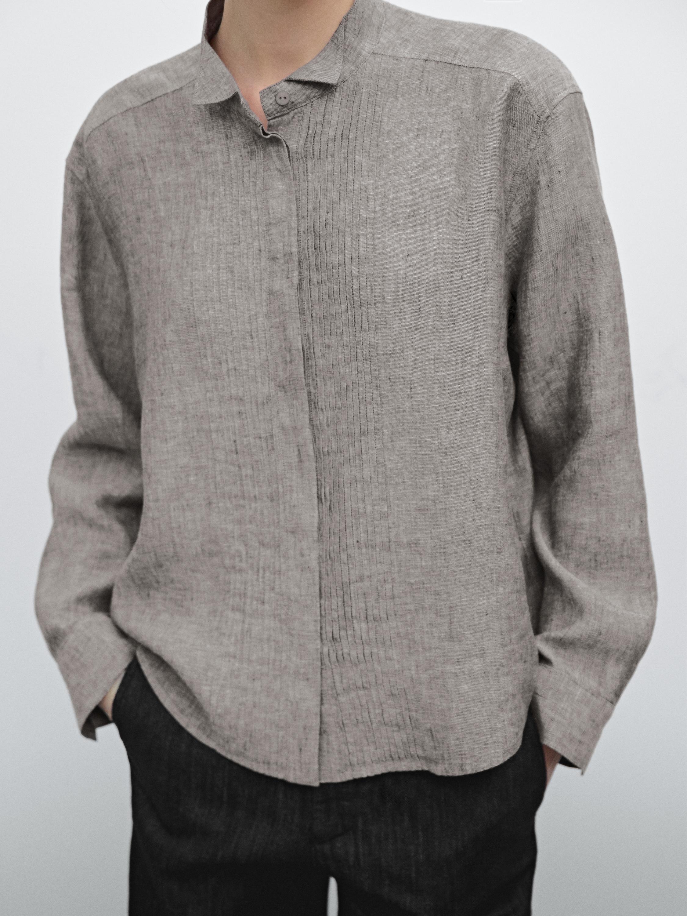 Camisa detalle jaretas 100% lino