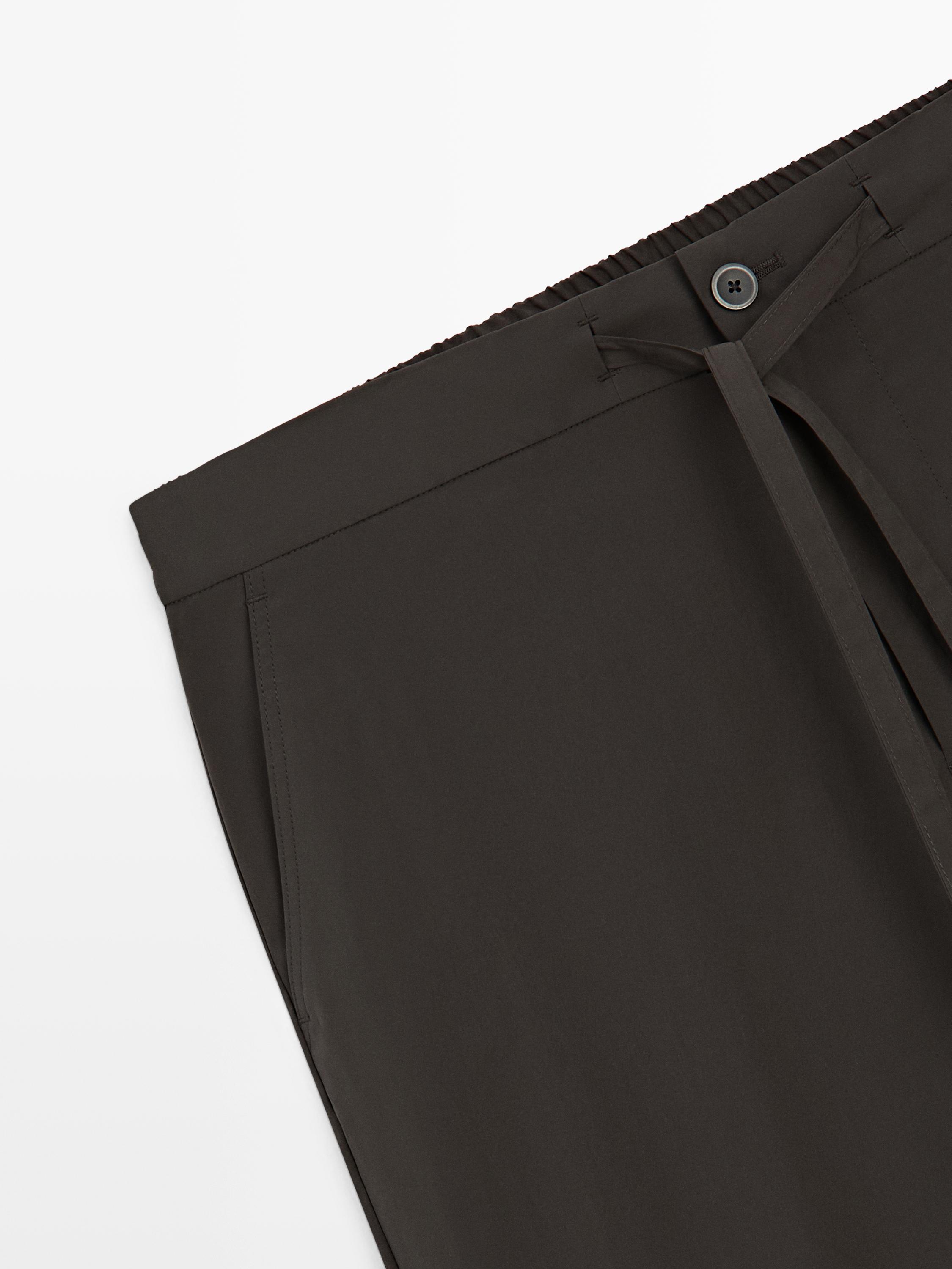 Total look technical trousers — BROWN