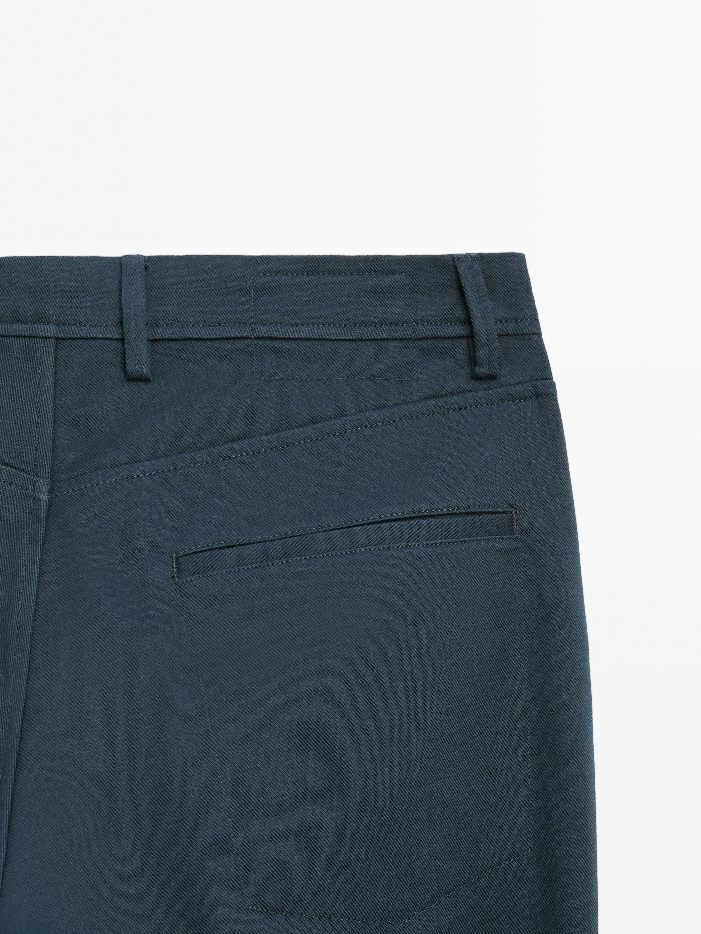 Cotton blend tapered fit denim trousers