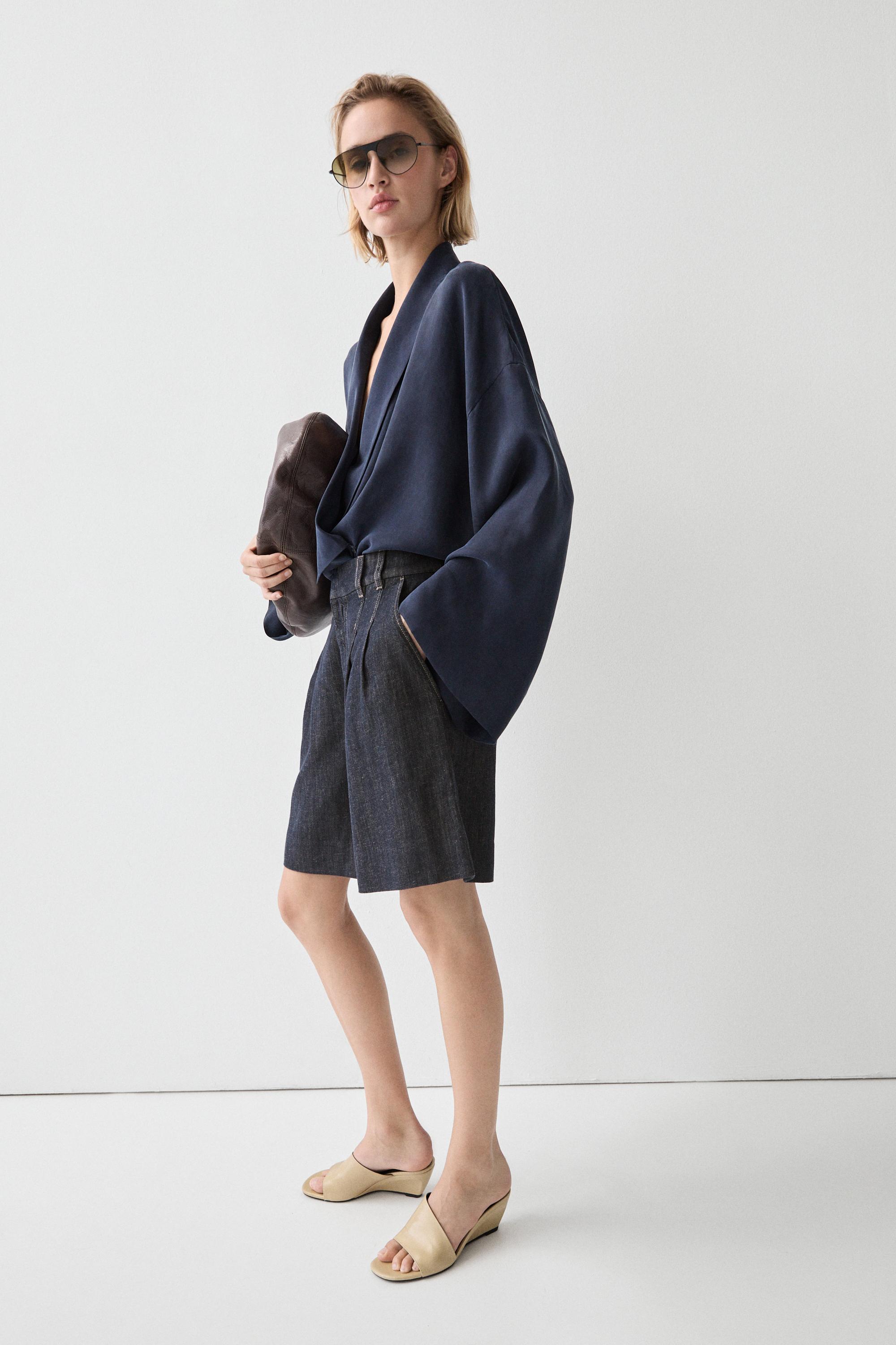 Cotton denim Bermuda shorts with topstitching — DARK BLUE