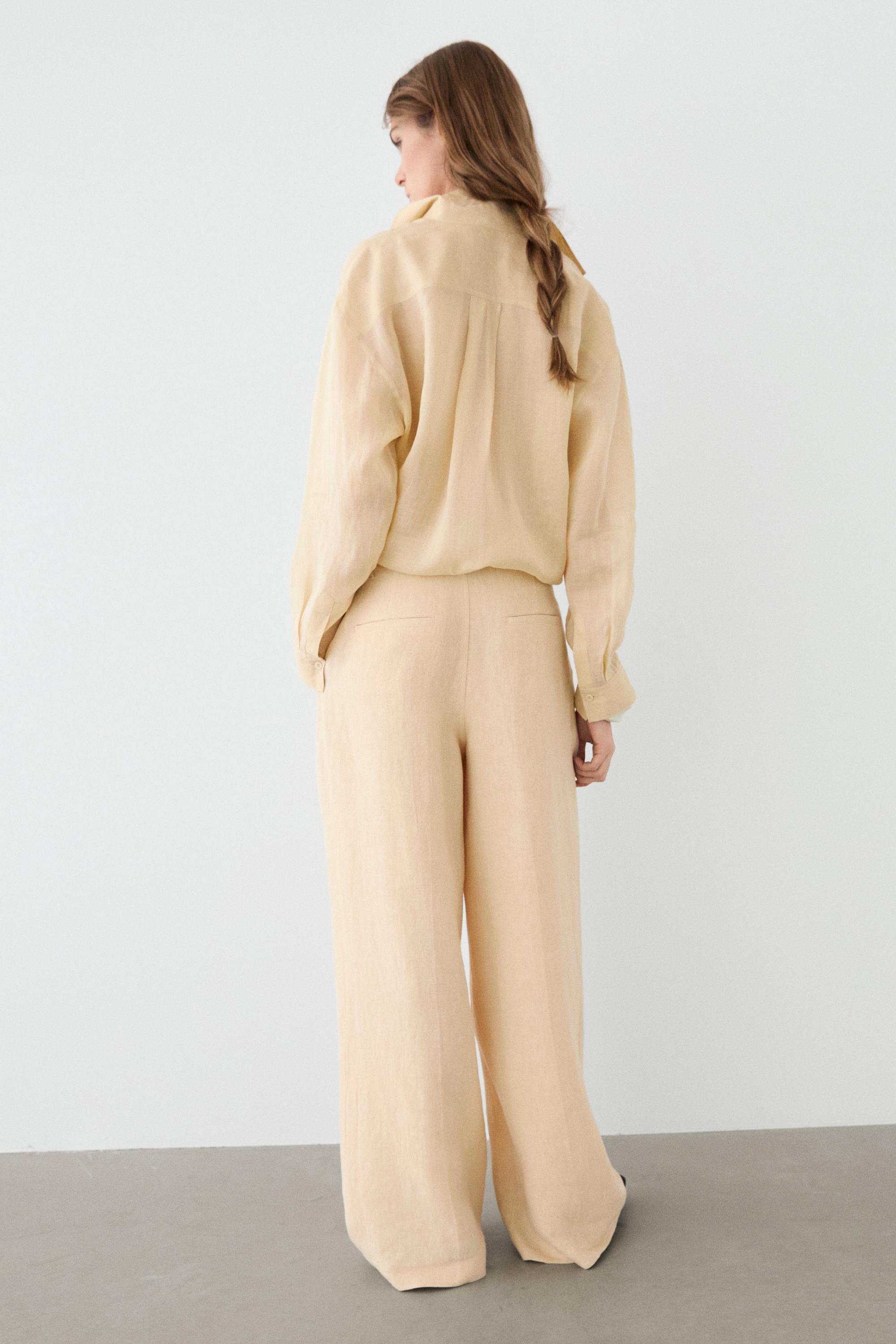 Wide-leg linen trousers with pocket detail — SAND