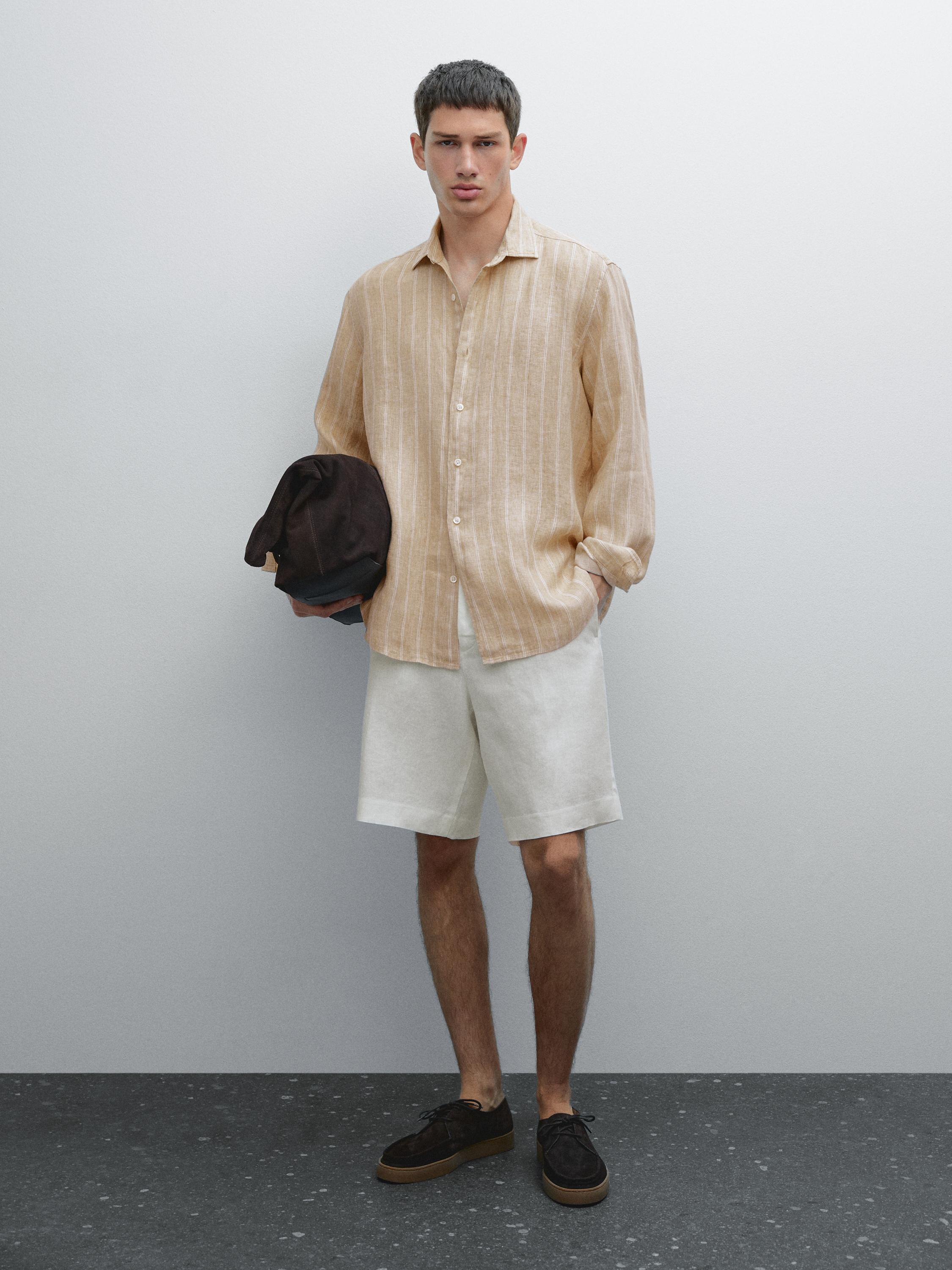 قميص بخطوط مزدوجة وقصة عادية