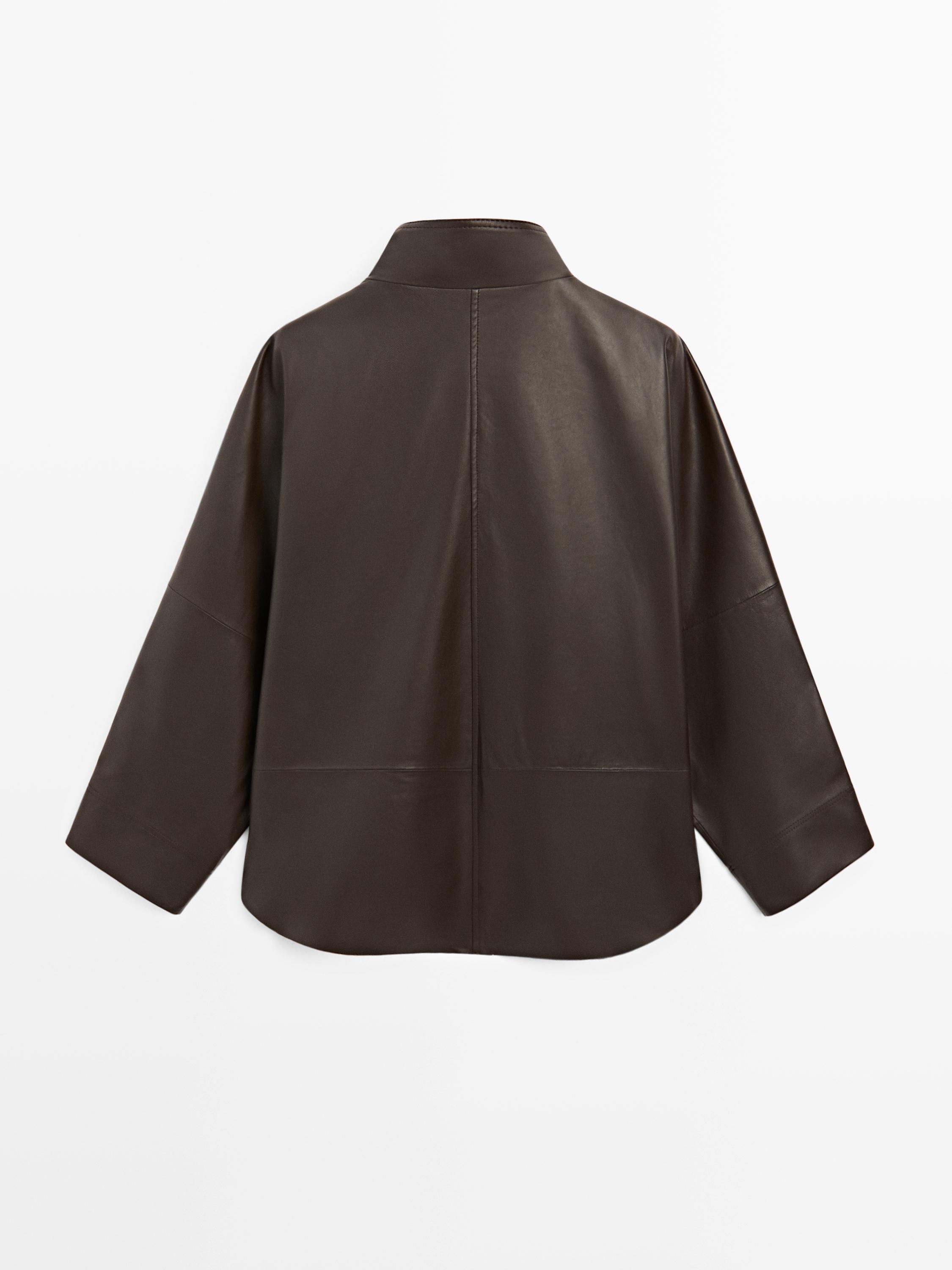 Xhaketë nappa me xhepa