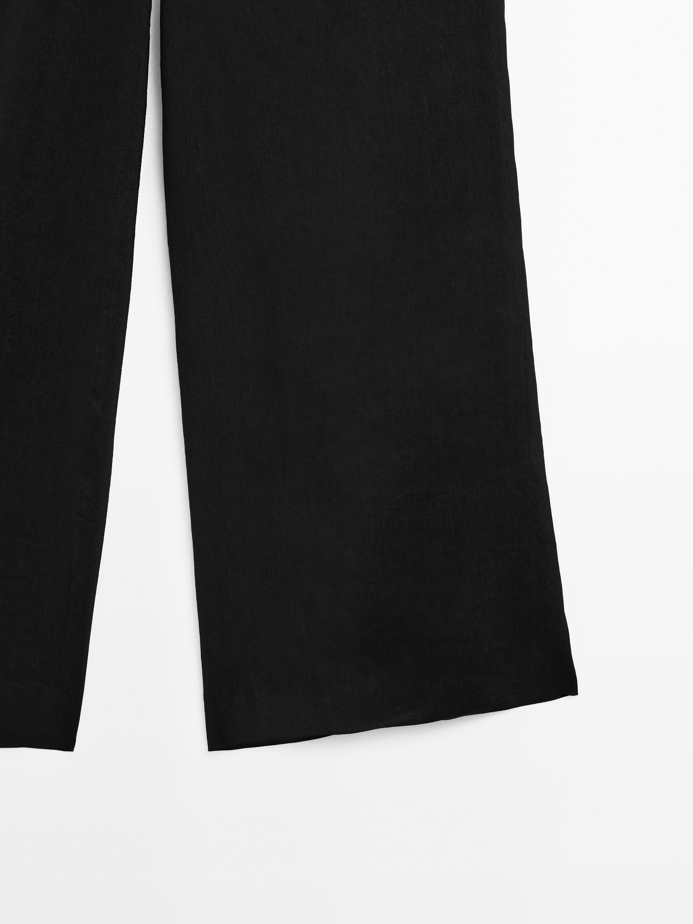 Flowing trousers with leather corset belt detail - Limited Edition