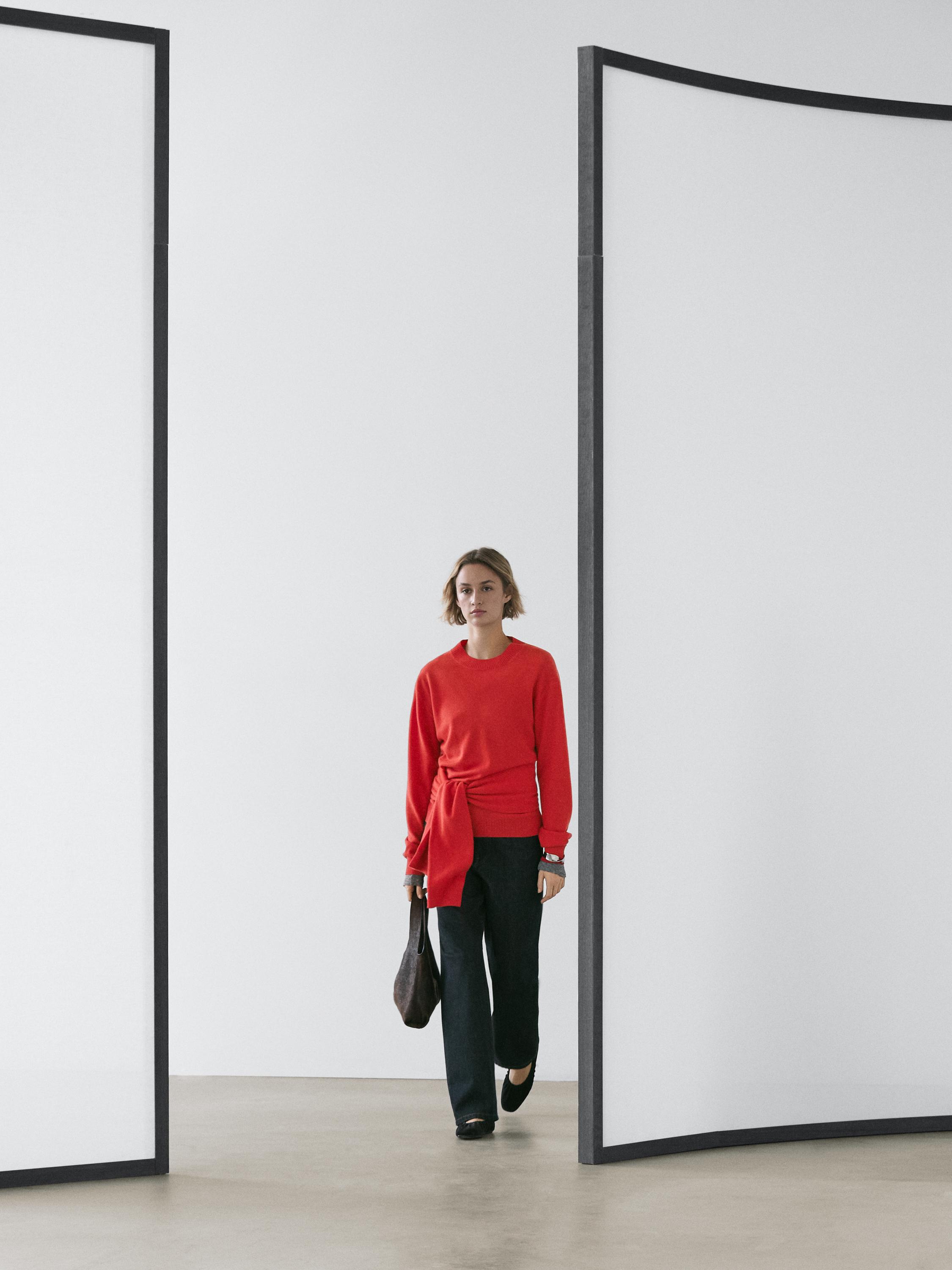 سويتر محاك صوف 100% بتفصيل على الخصر