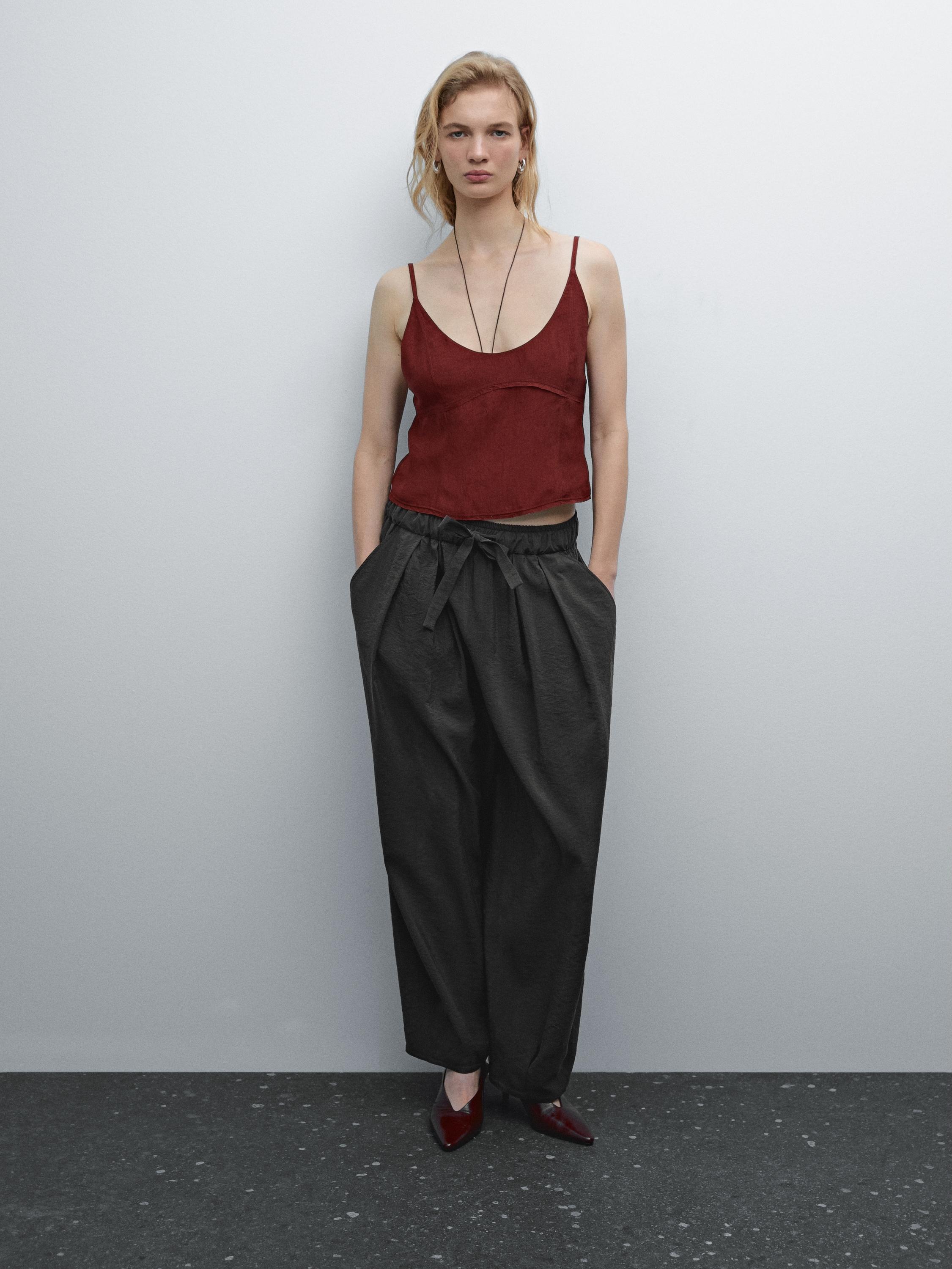 Strappy top with seam details