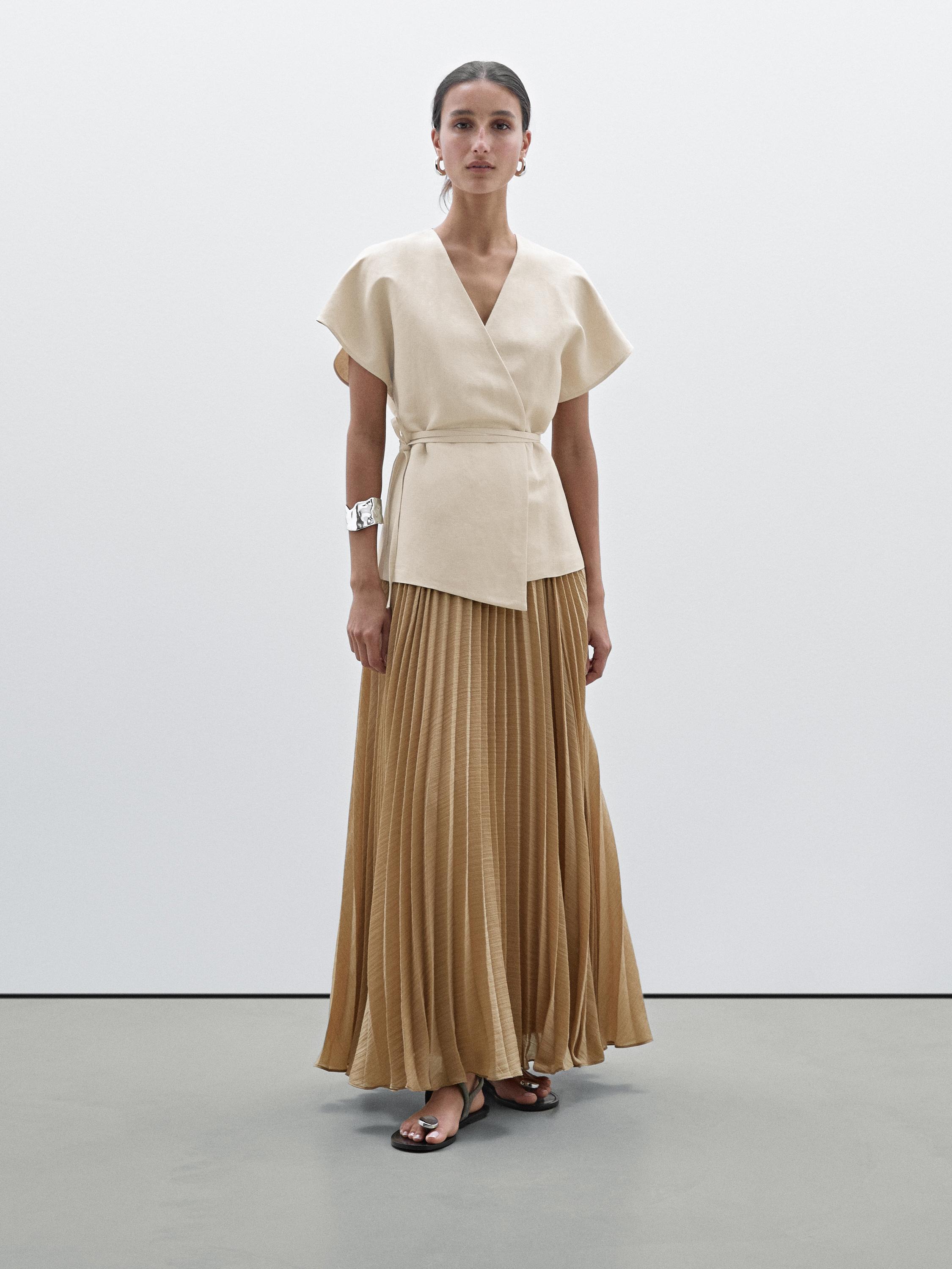 Long pleated dress with waistcoat detail