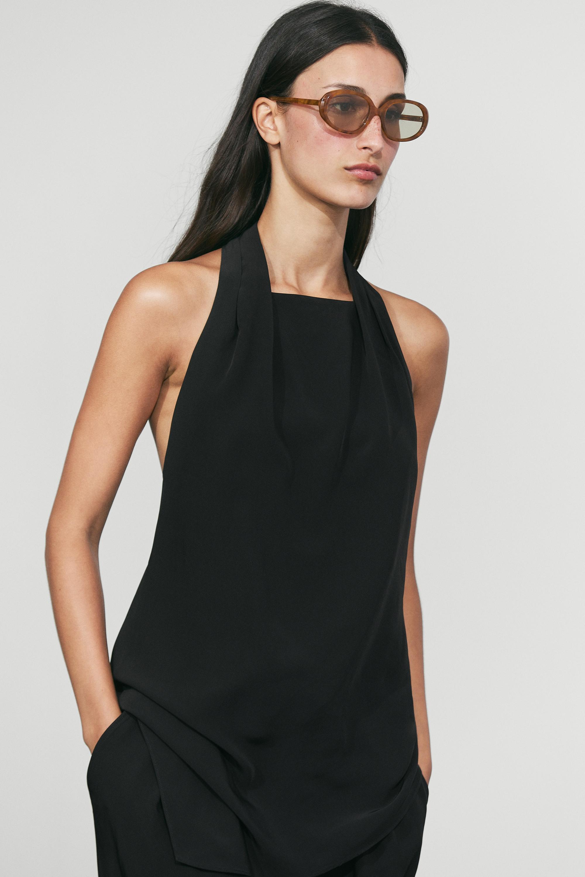 Flowing open-back top