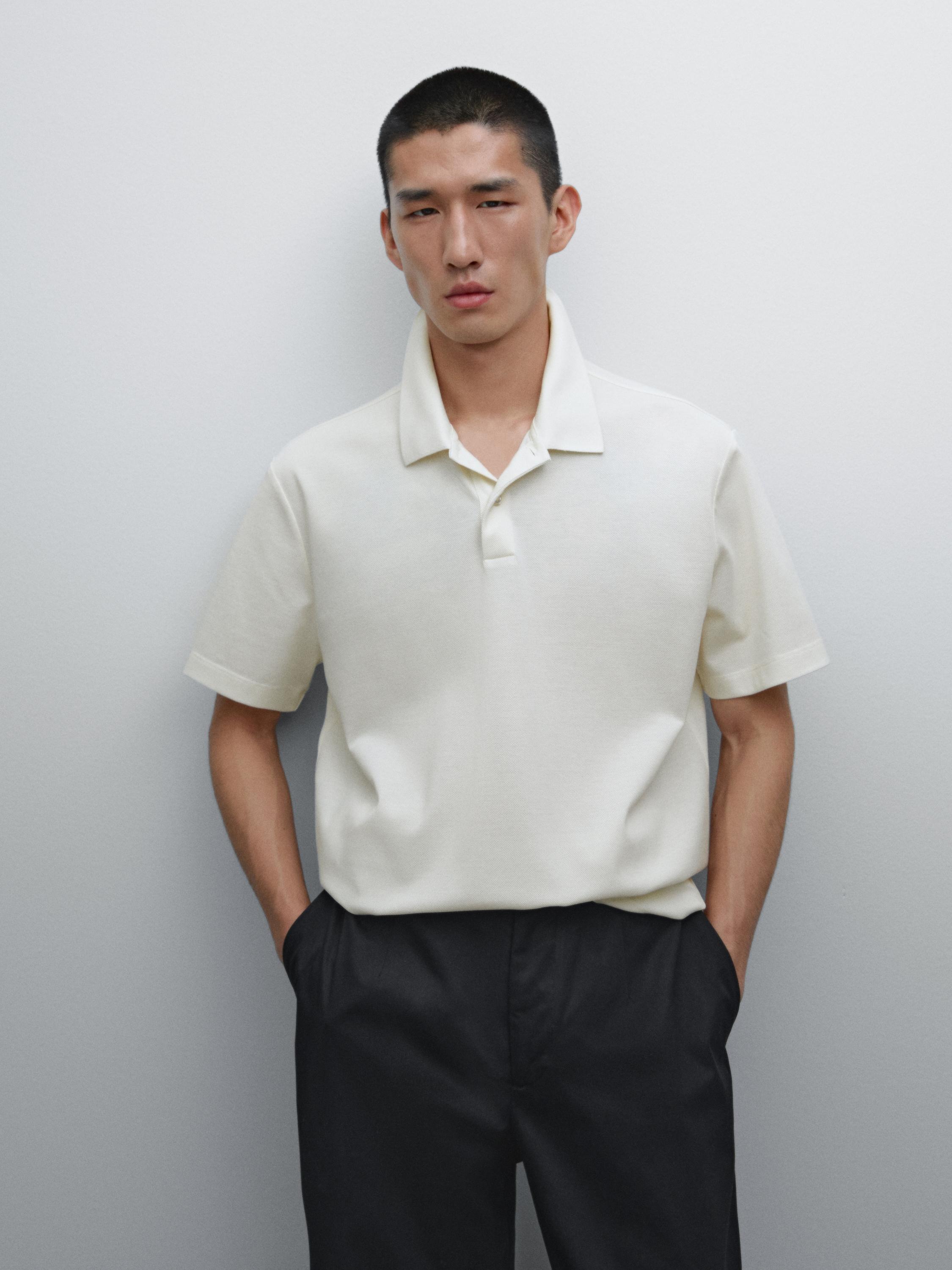 قميص بولو قطن 100% بنسيج دقيق بارز الملمس