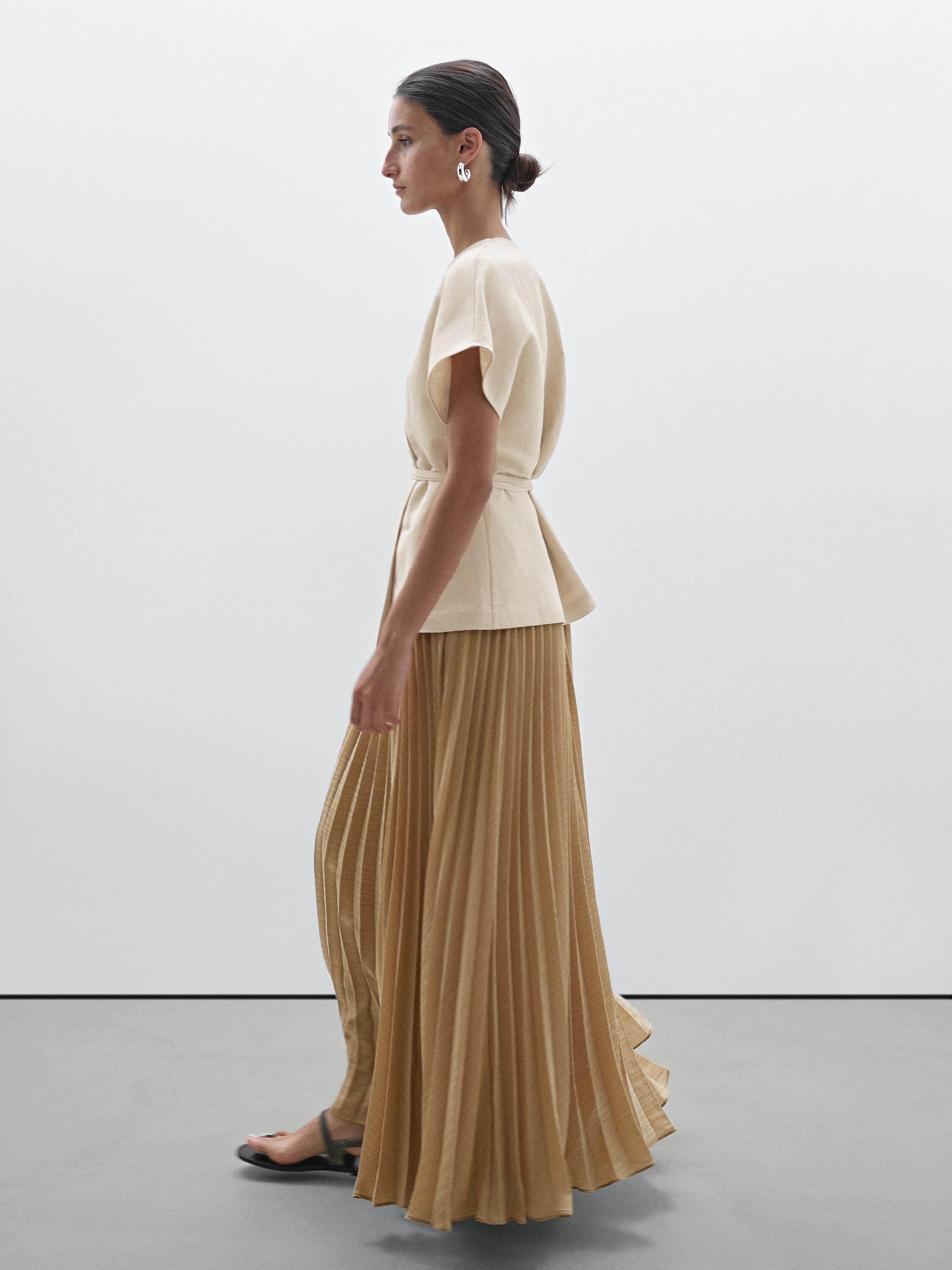 Long pleated dress with waistcoat detail