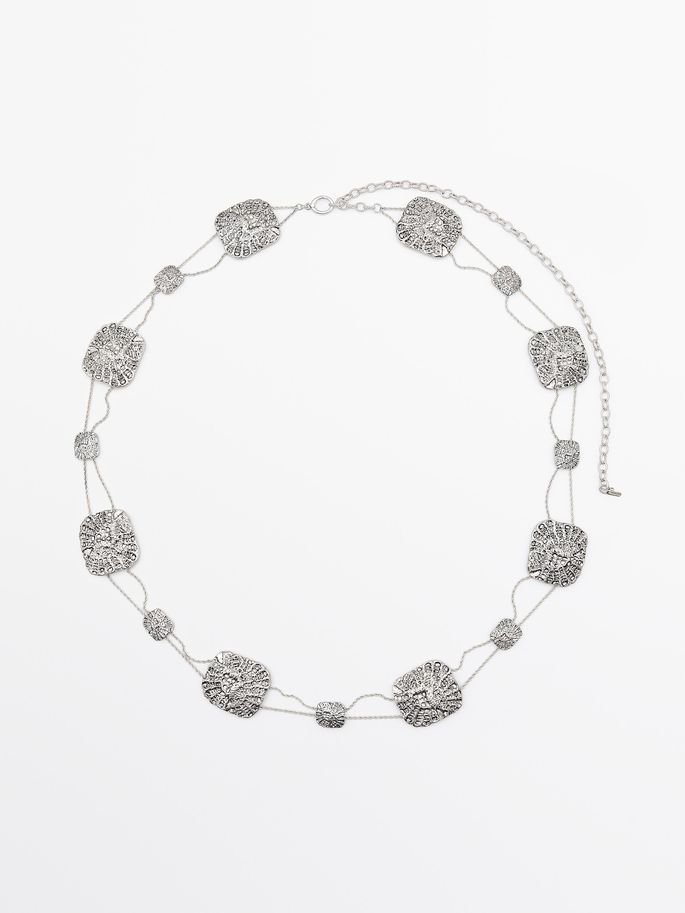 Textured medallion chain belt