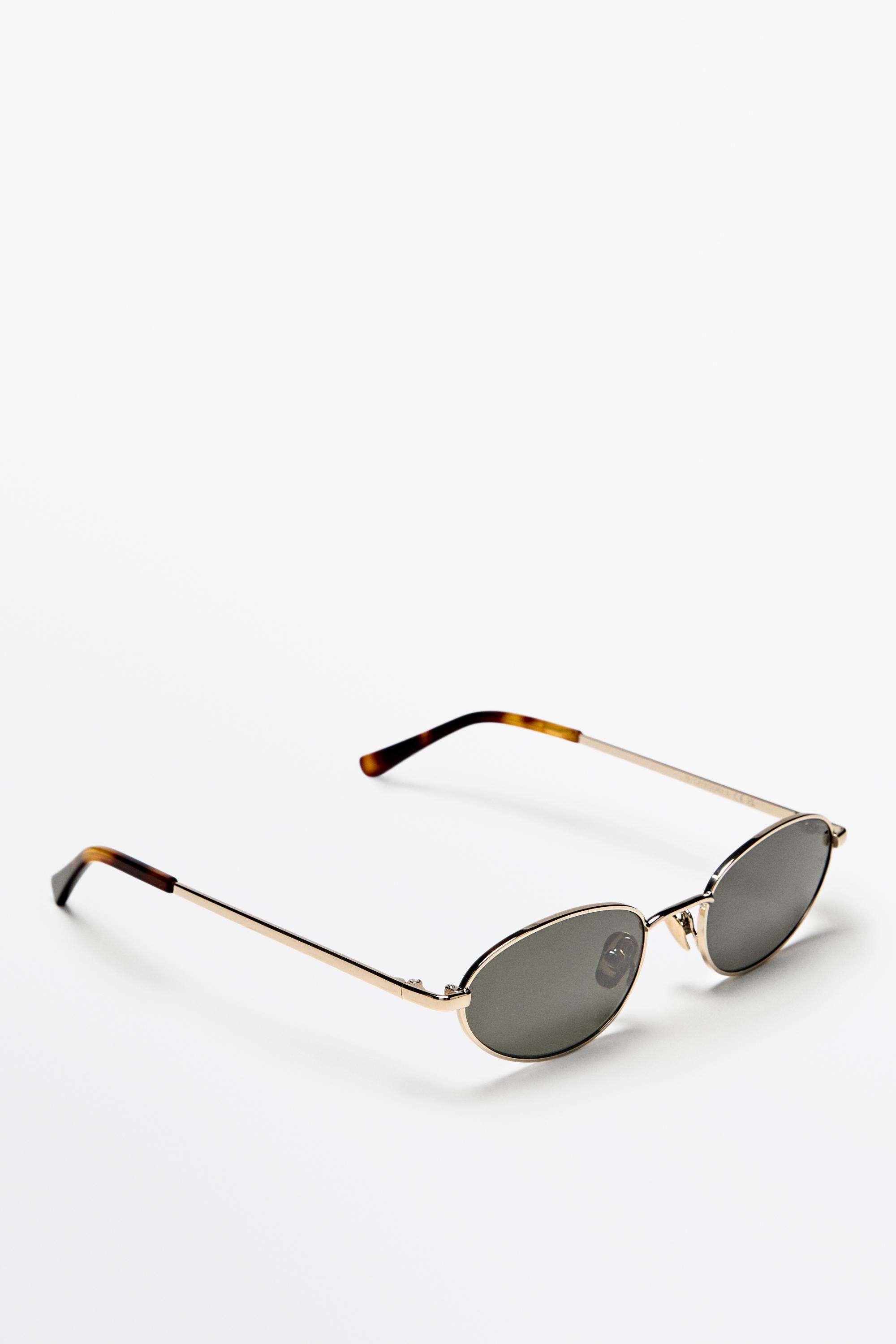 Oval metal sunglasses — GOLDEN
