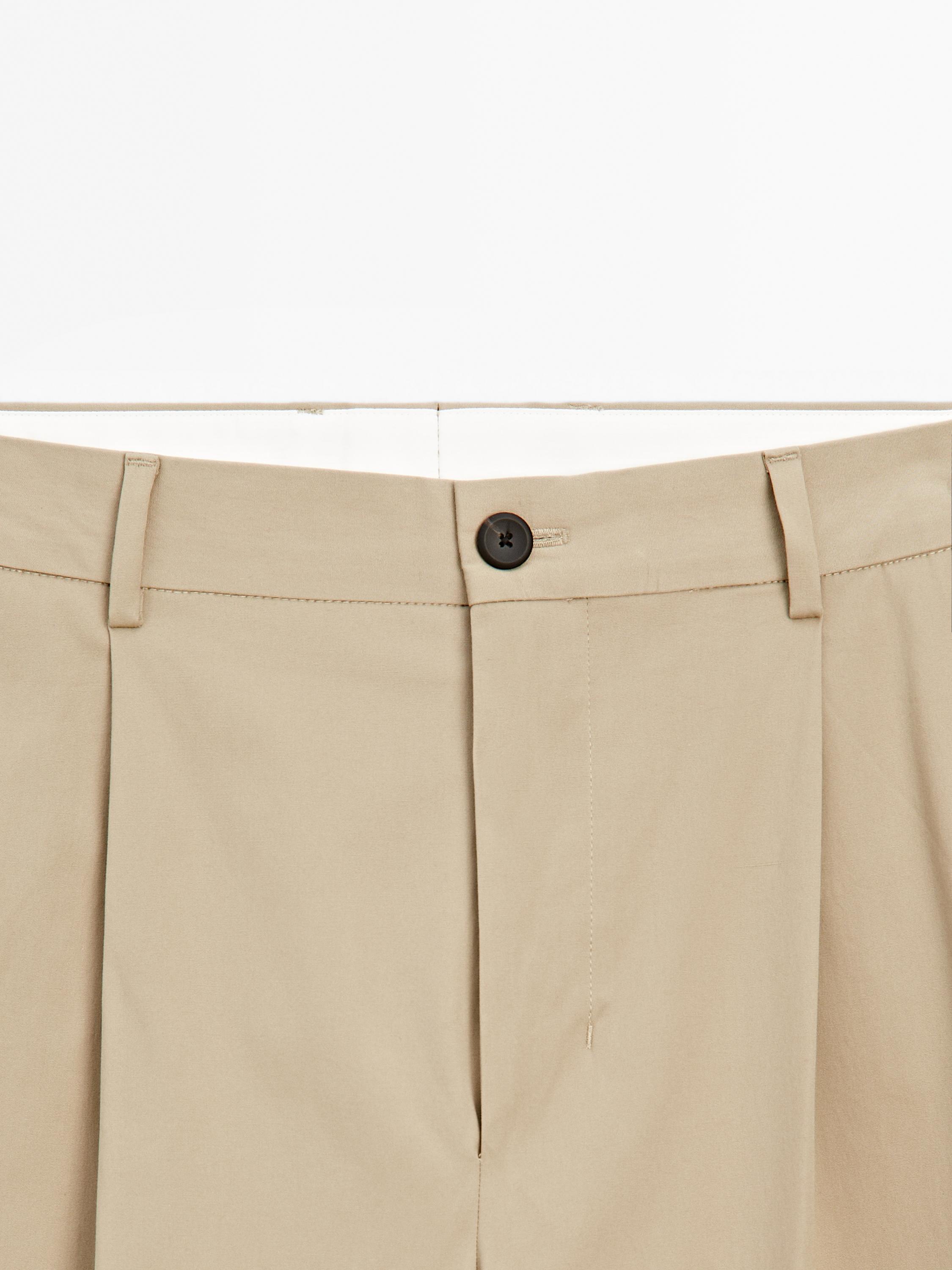 Pantalon relaxed fit à pinces